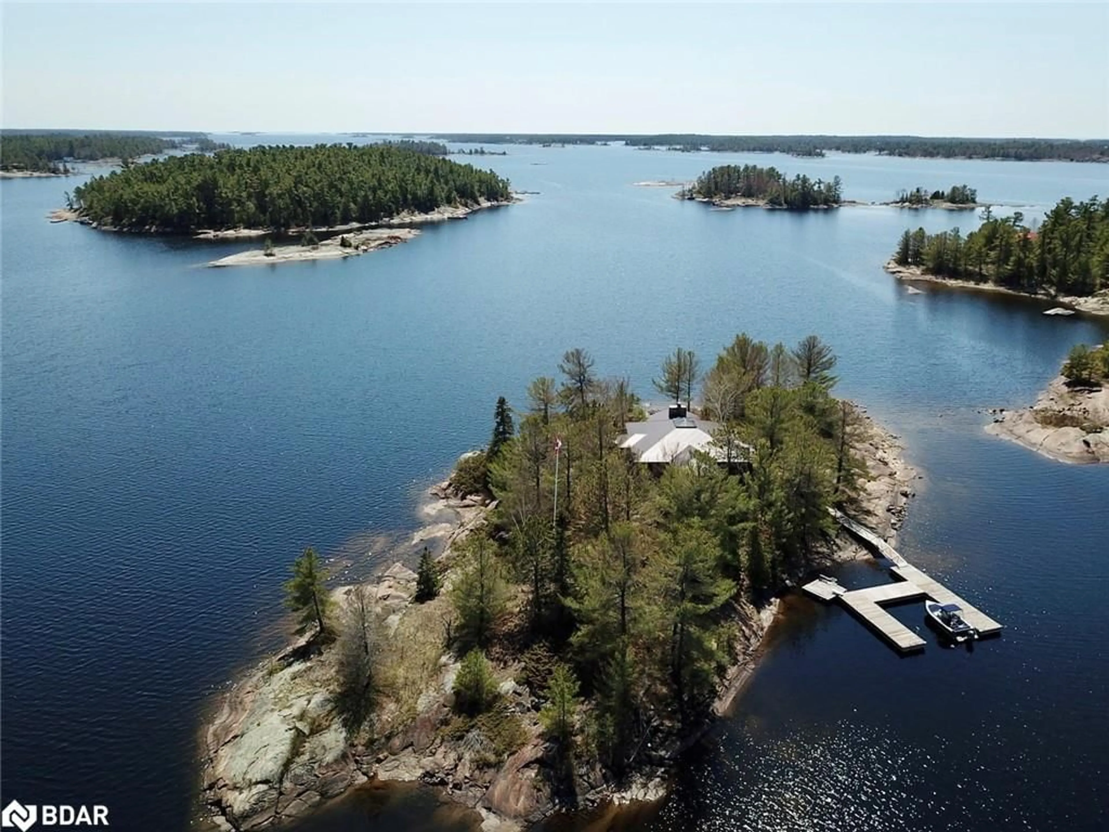 A pic from outside/outdoor area/front of a property/back of a property/a pic from drone, water/lake/river/ocean view for 1 A52 Island, Pointe au Baril Ontario P0G 1K0