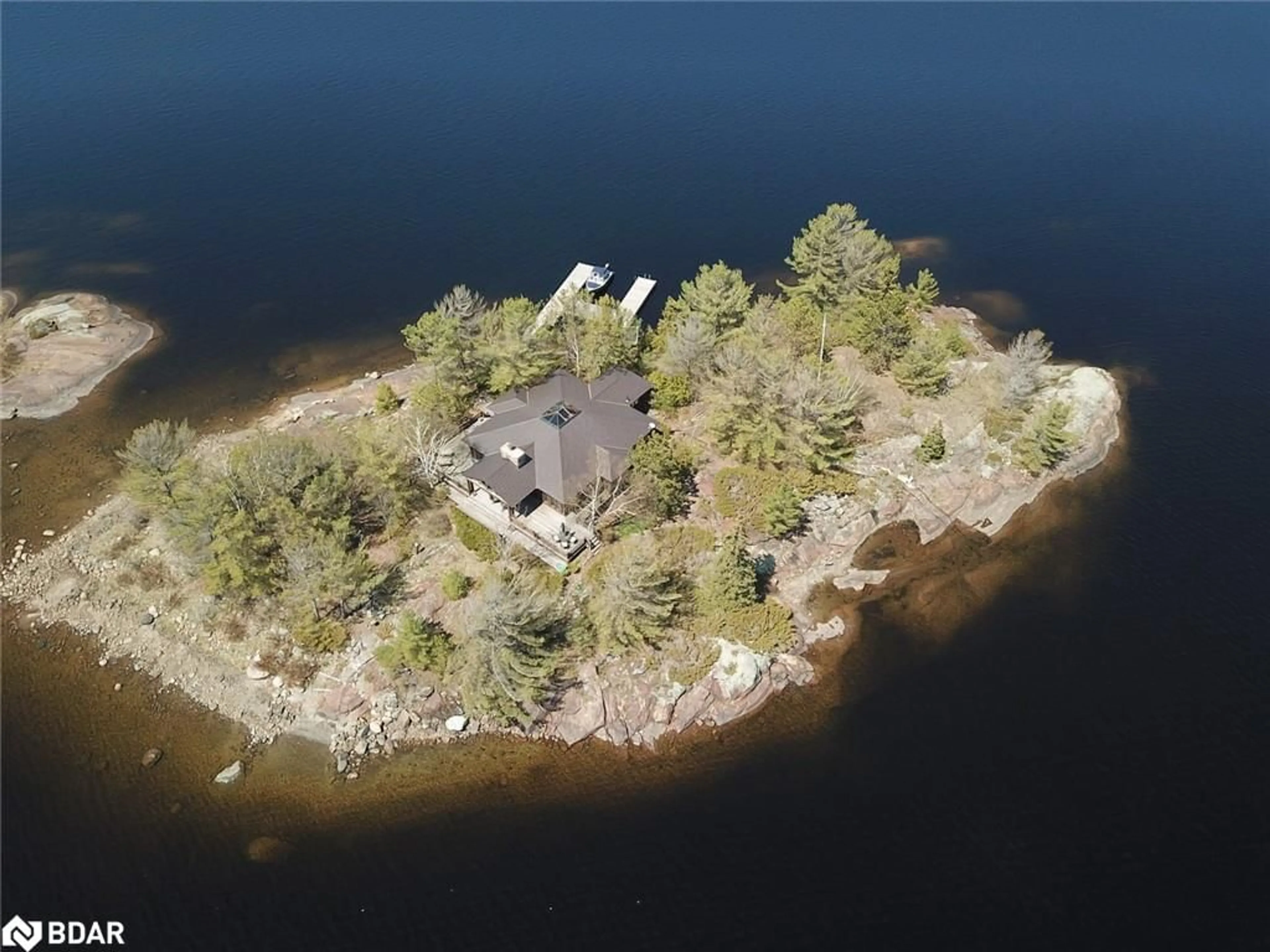 A pic from outside/outdoor area/front of a property/back of a property/a pic from drone, water/lake/river/ocean view for 1 A52 Island, Pointe au Baril Ontario P0G 1K0