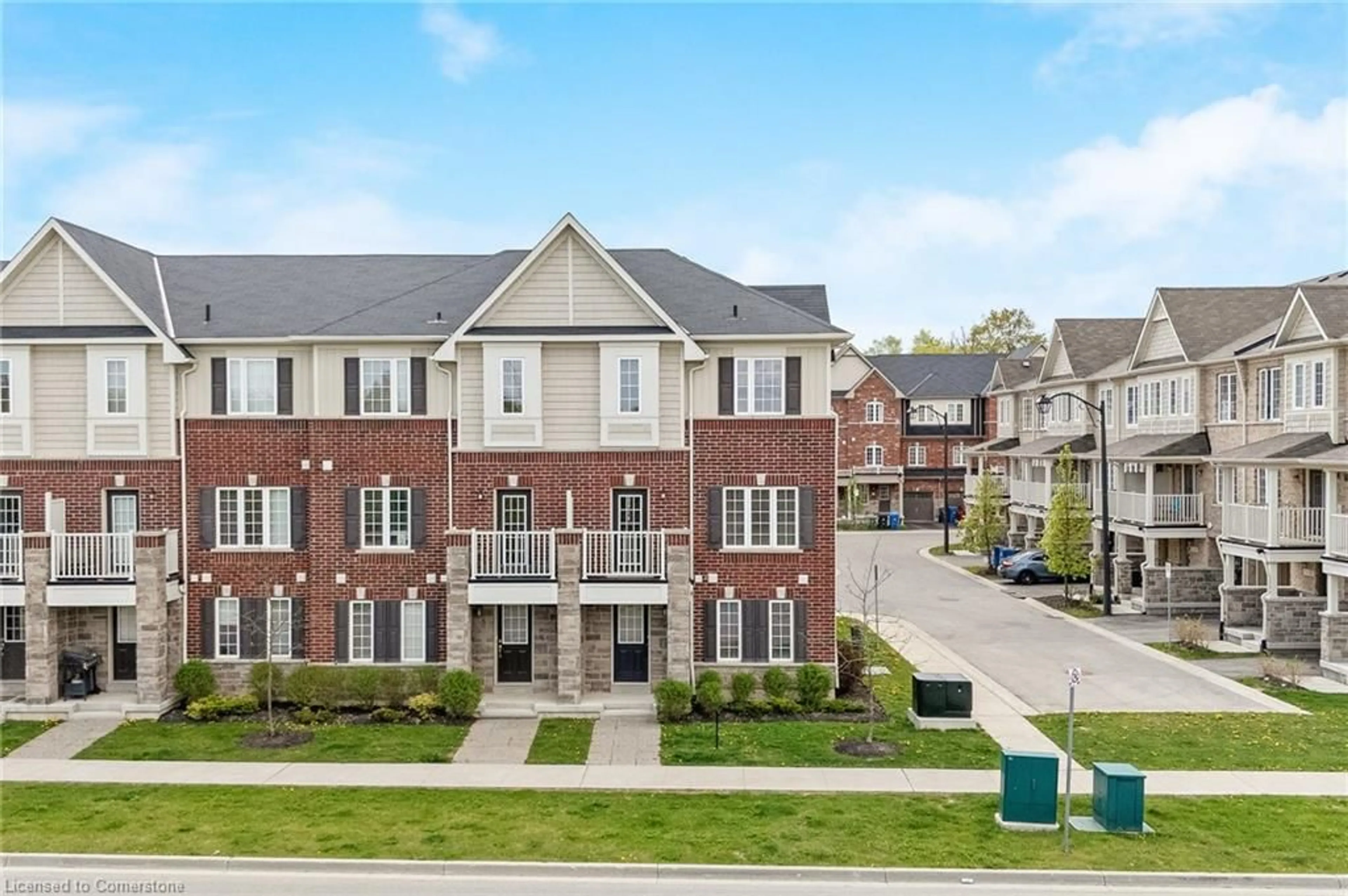A pic from outside/outdoor area/front of a property/back of a property/a pic from drone, street for 88 Decorso Drive Dr #5, Guelph Ontario N1L 0A1