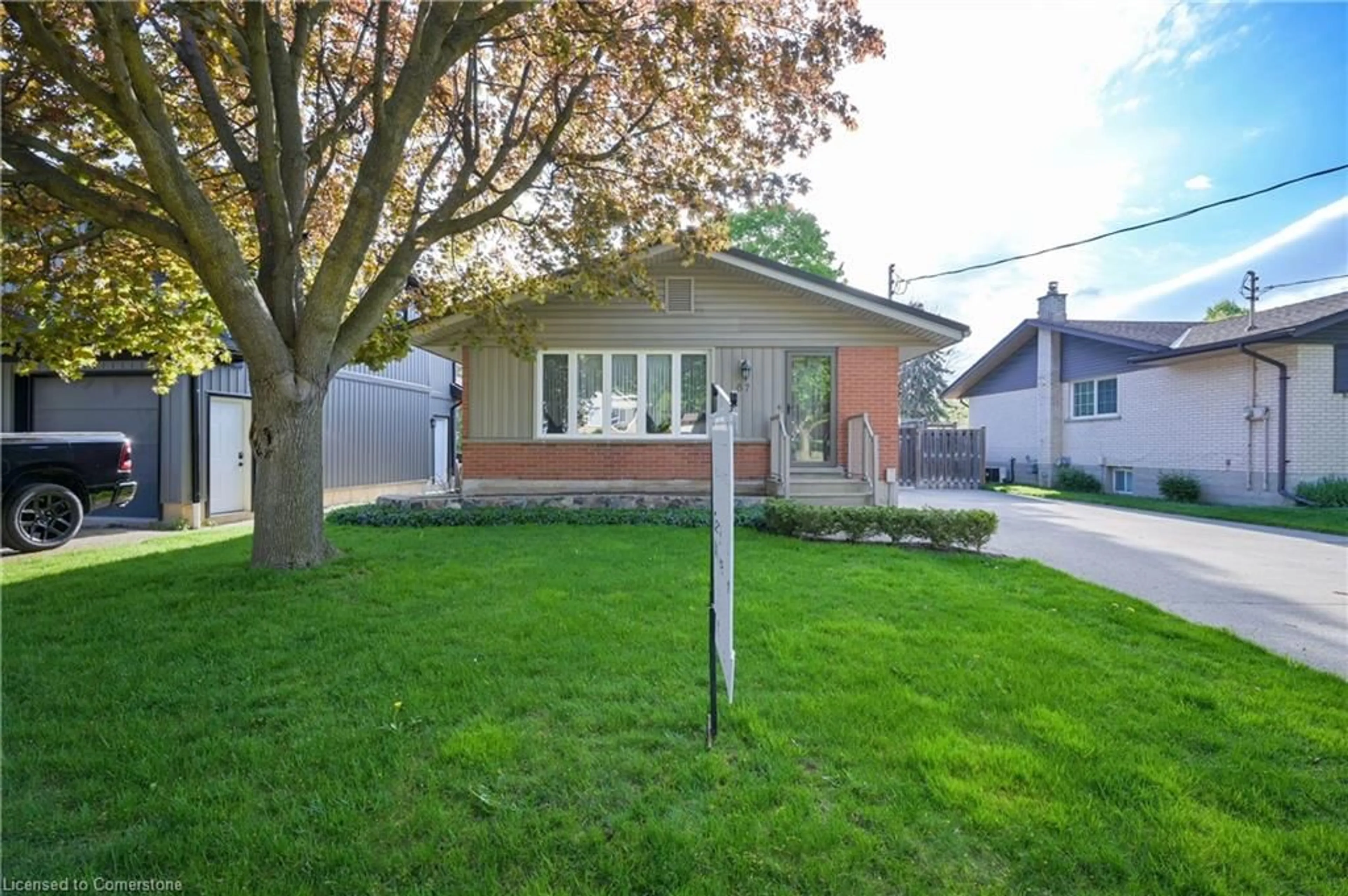Home with brick exterior material, street for 67 Ruskview Rd, Kitchener Ontario N2M 4S1