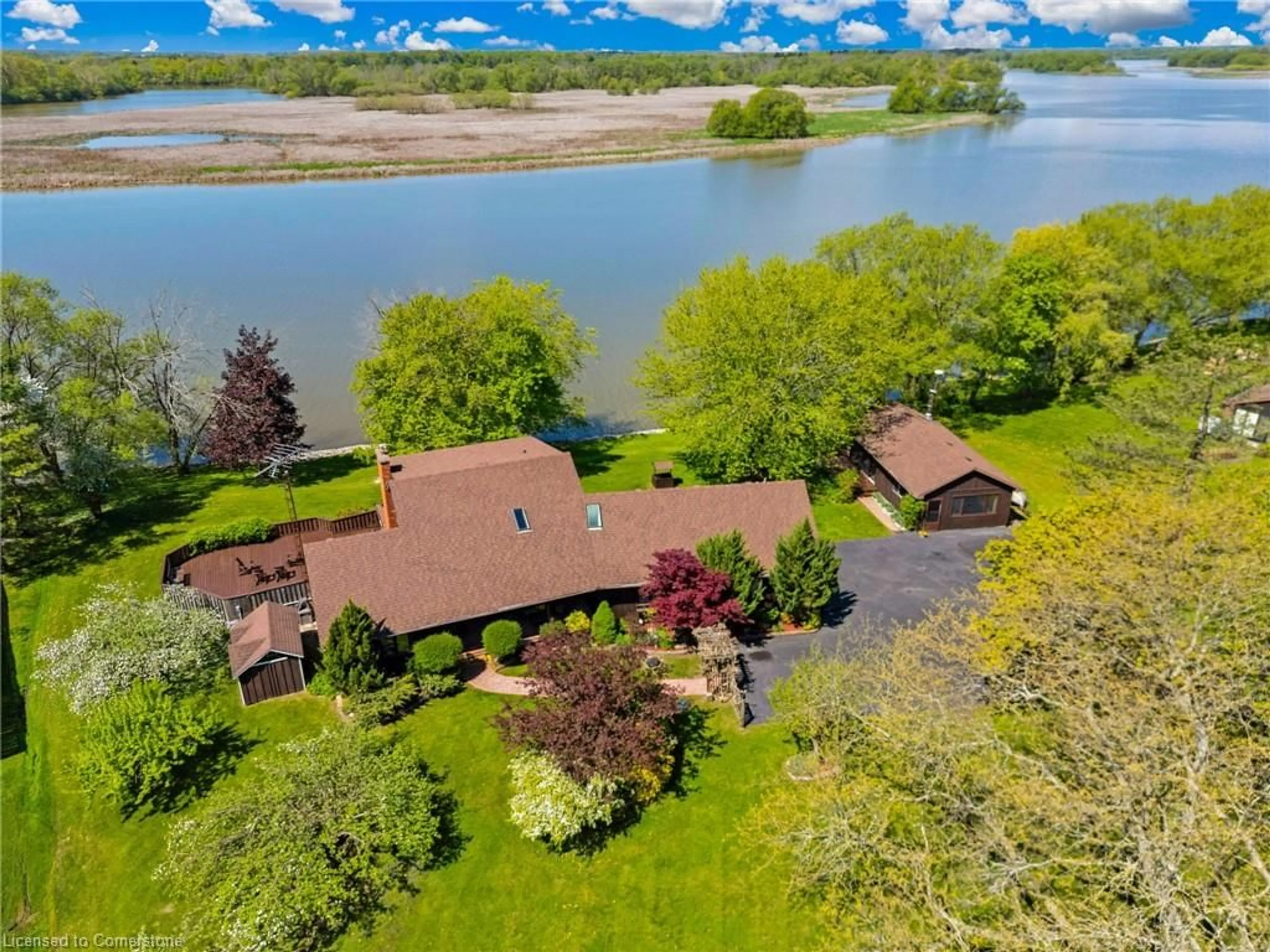 A pic from outside/outdoor area/front of a property/back of a property/a pic from drone, water/lake/river/ocean view for 35 Haldimand Road 17, Dunnville Ontario N1A 2W4