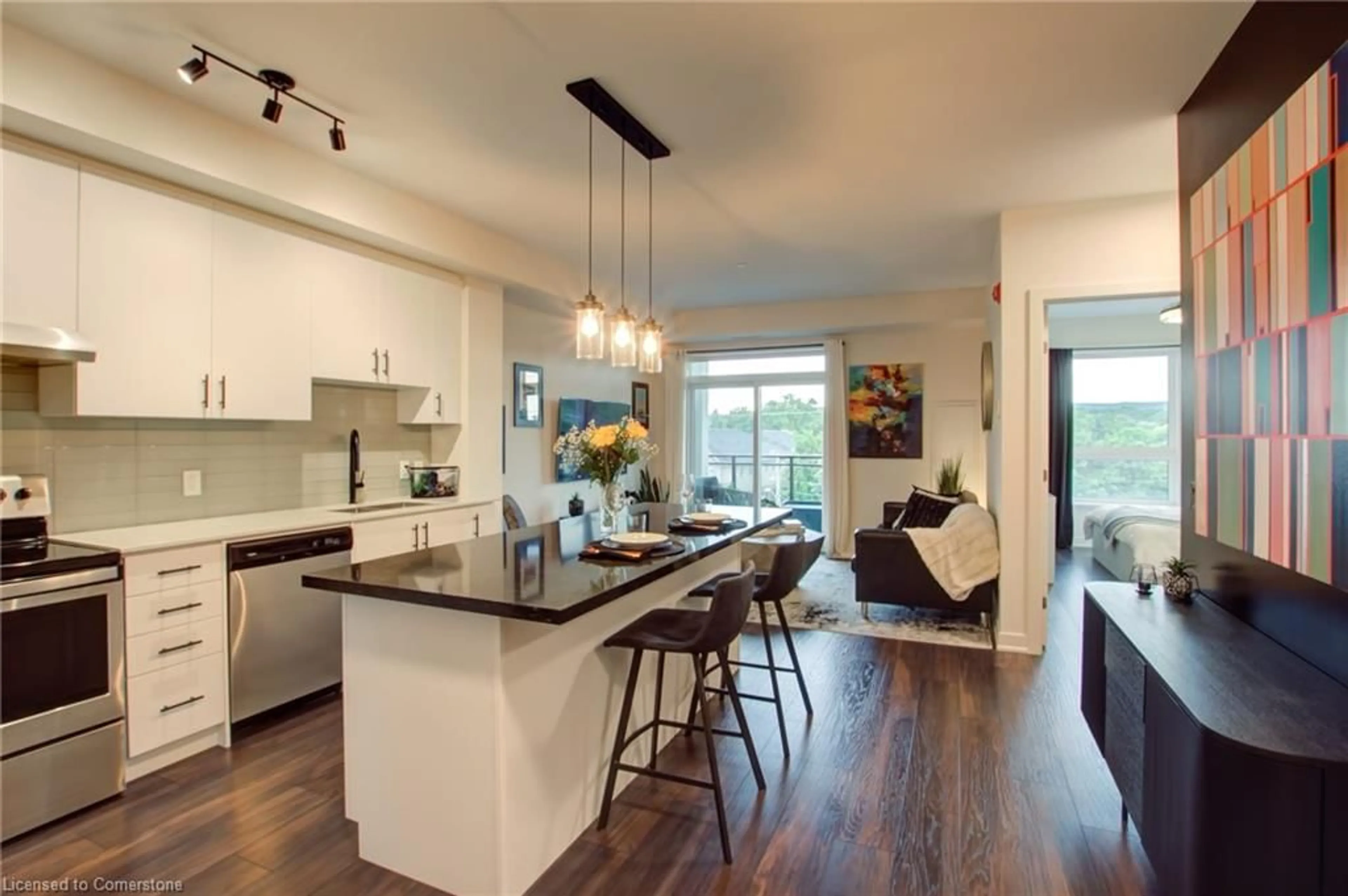 Open concept kitchen, wood/laminate floor for 320 Plains Rd #414, Burlington Ontario L7T 0C1