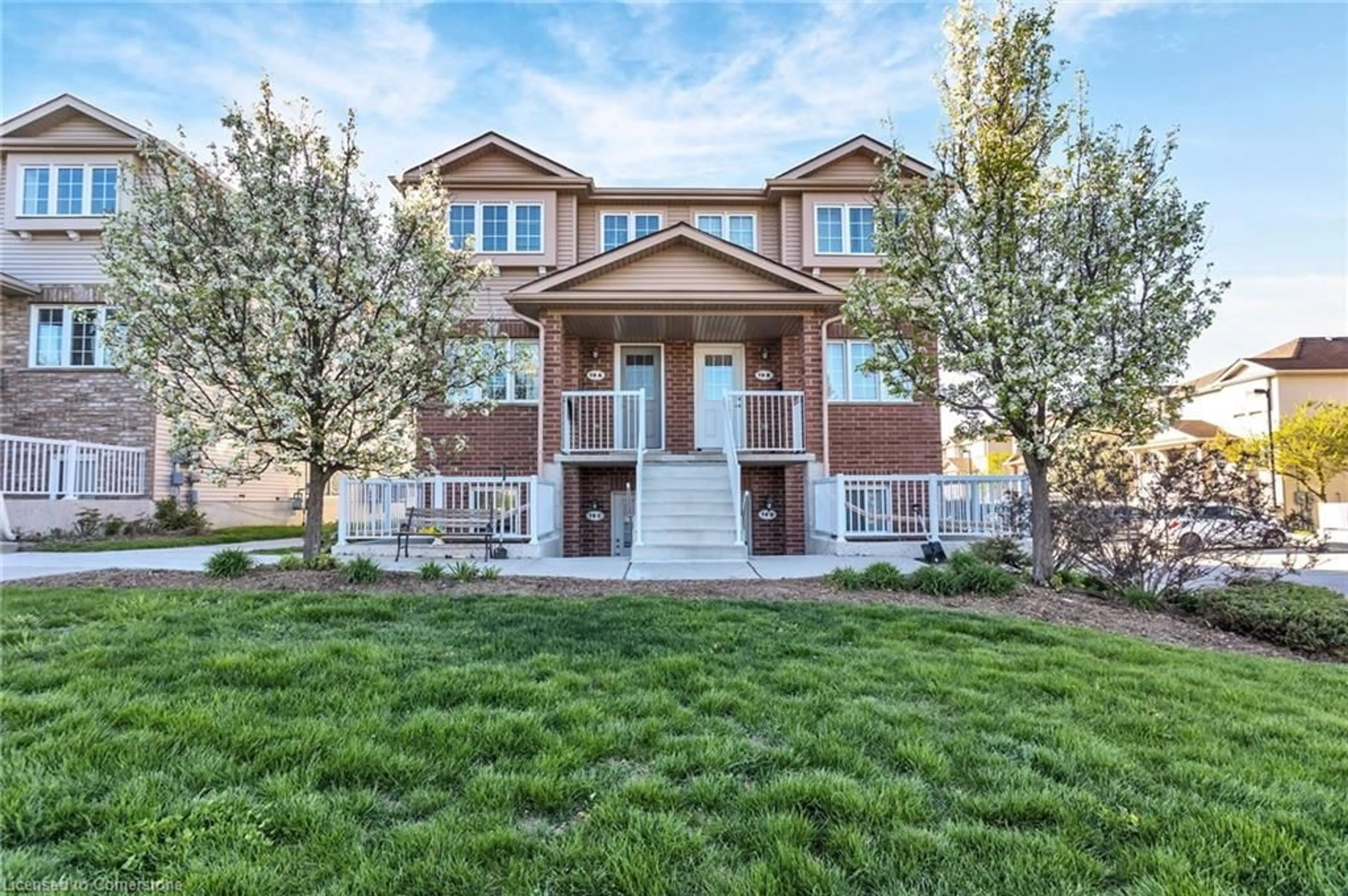 Home with vinyl exterior material, street for 50 Howe Dr #1A, Kitchener Ontario N2E 0A3