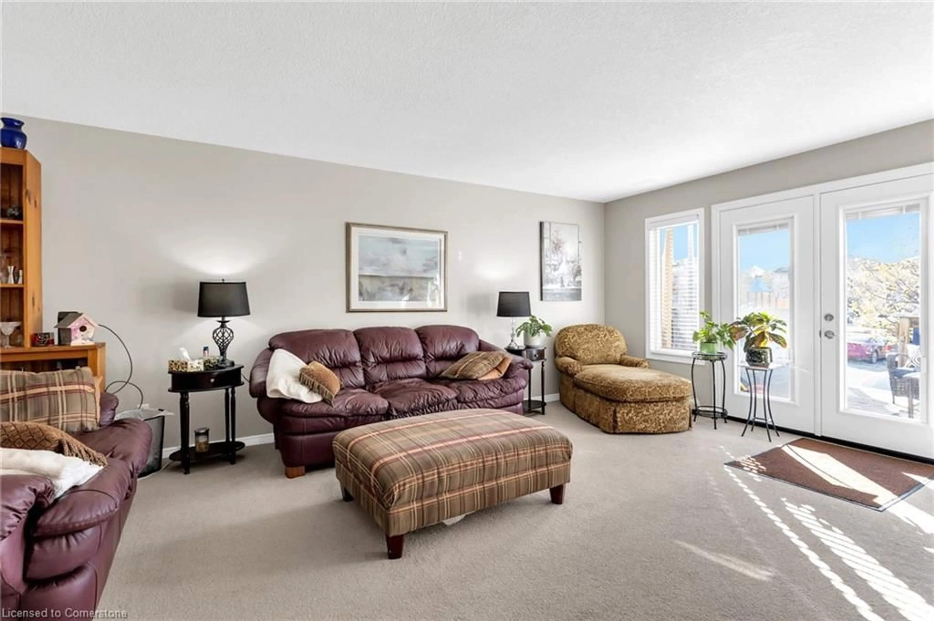 Living room with furniture, carpet floor for 50 Howe Dr #1A, Kitchener Ontario N2E 0A3