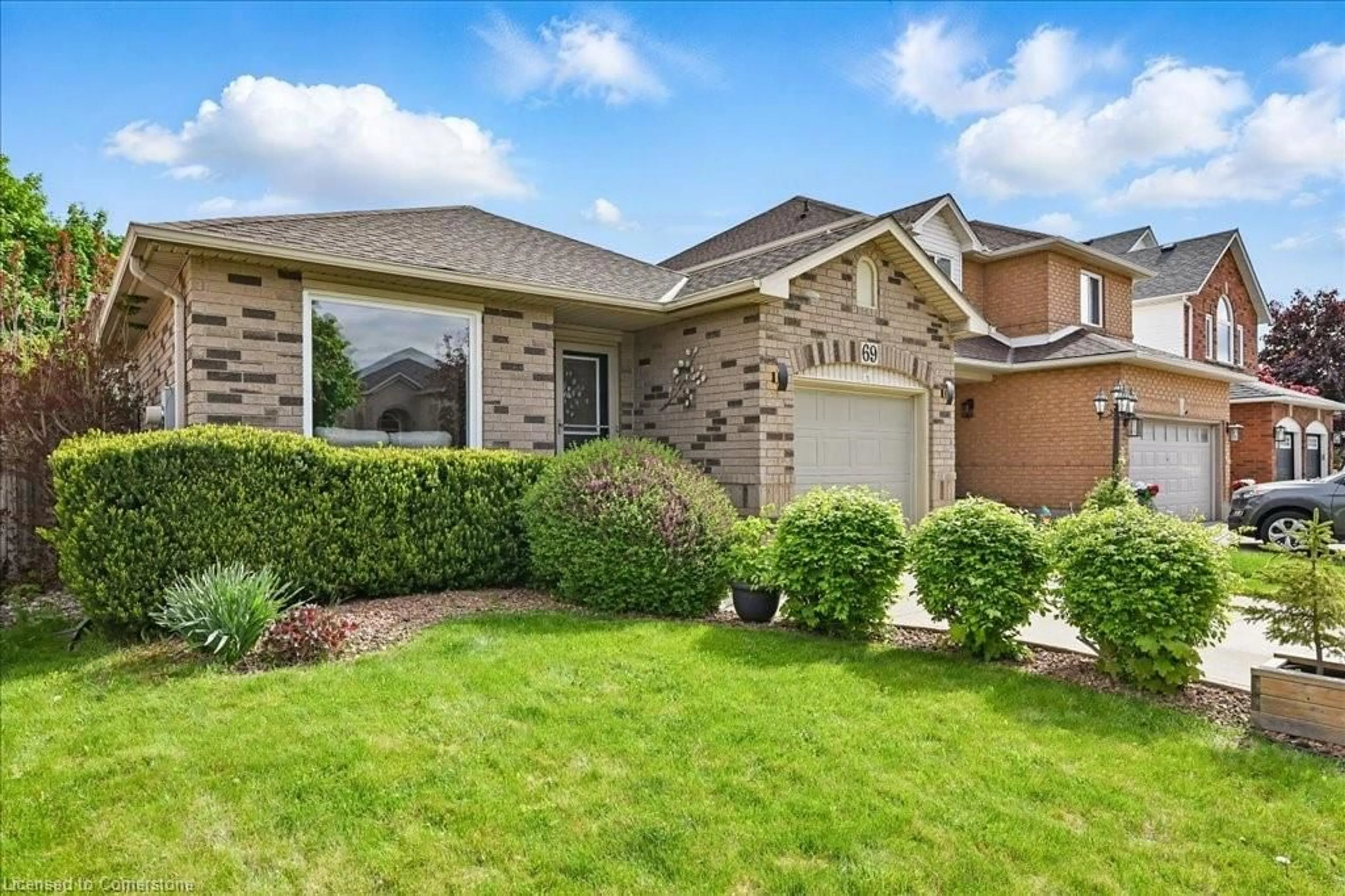 Home with brick exterior material, street for 69 Hillgarden Dr, Stoney Creek Ontario L8J 3S7