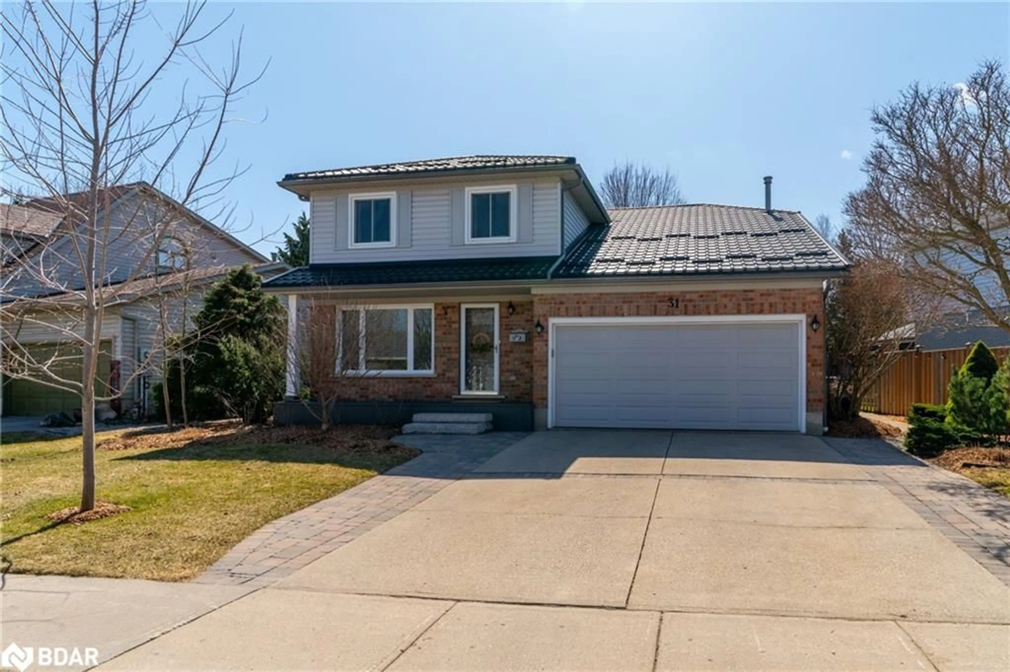 Home with brick exterior material, street for 31 Cherrywood Dr, Guelph Ontario N1K 1R7