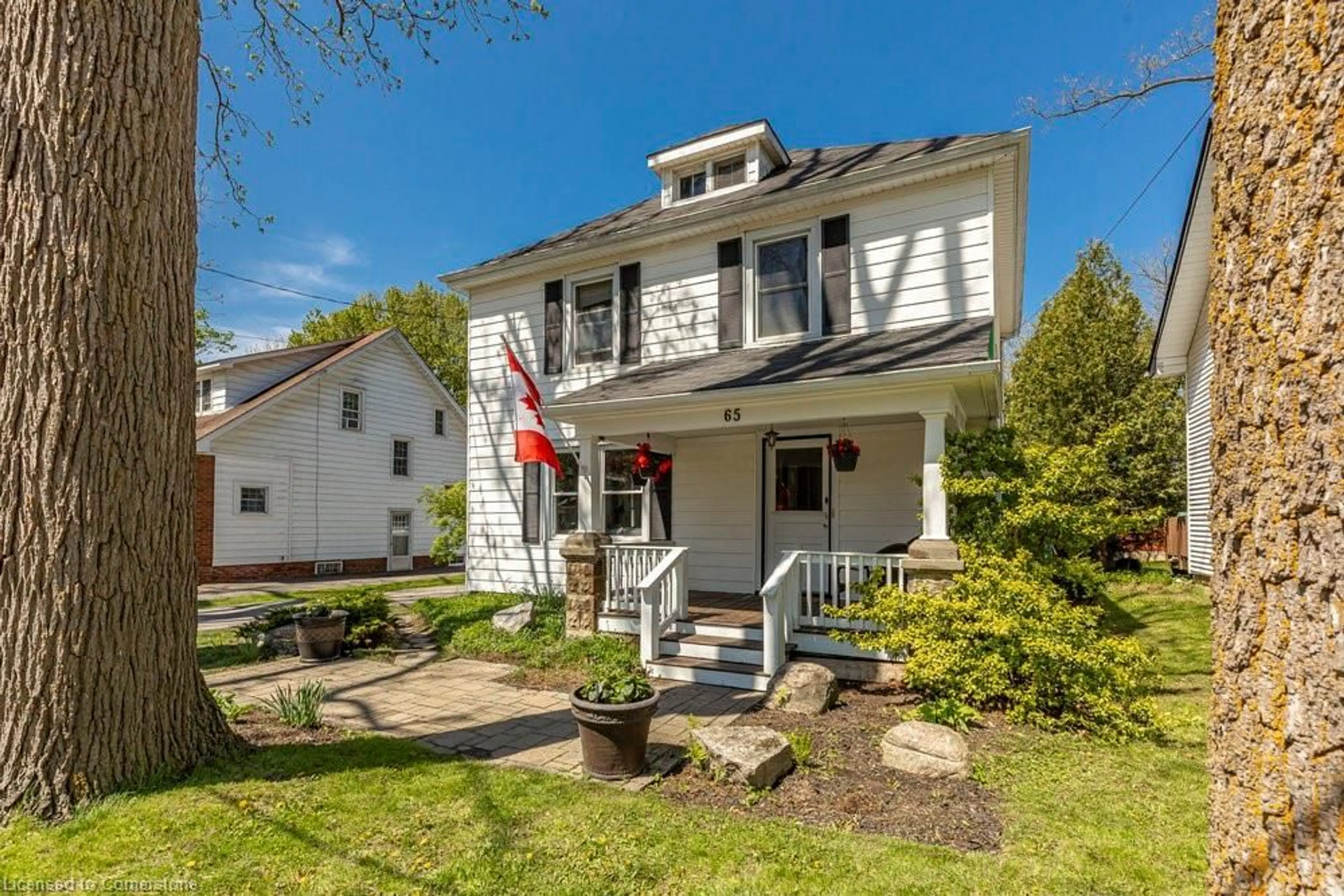 Home with vinyl exterior material, street for 65 Banff St, Caledonia Ontario N3W 1C2