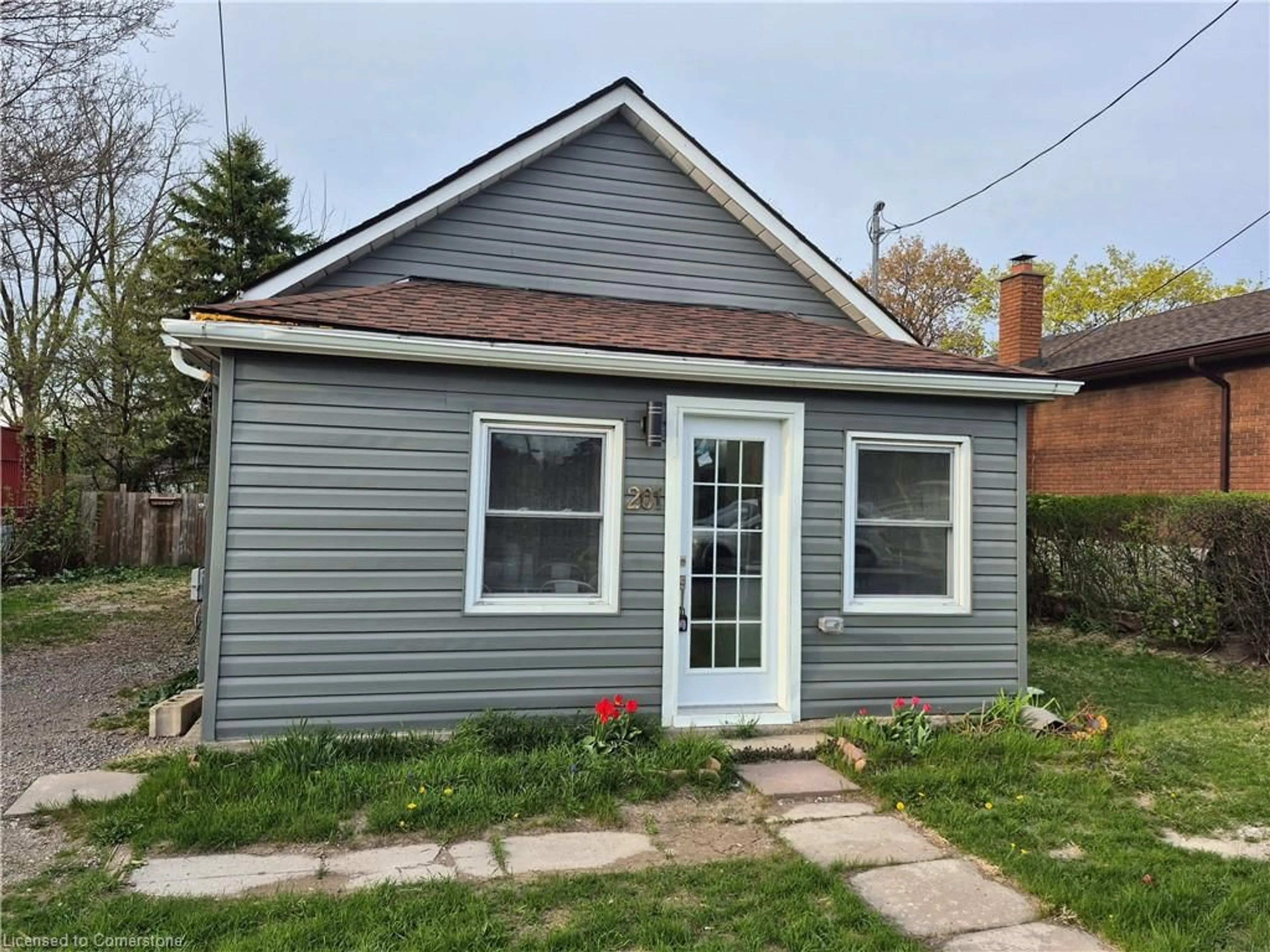 Home with vinyl exterior material, street for 201 Fennell Ave, Hamilton Ontario L9A 1S5