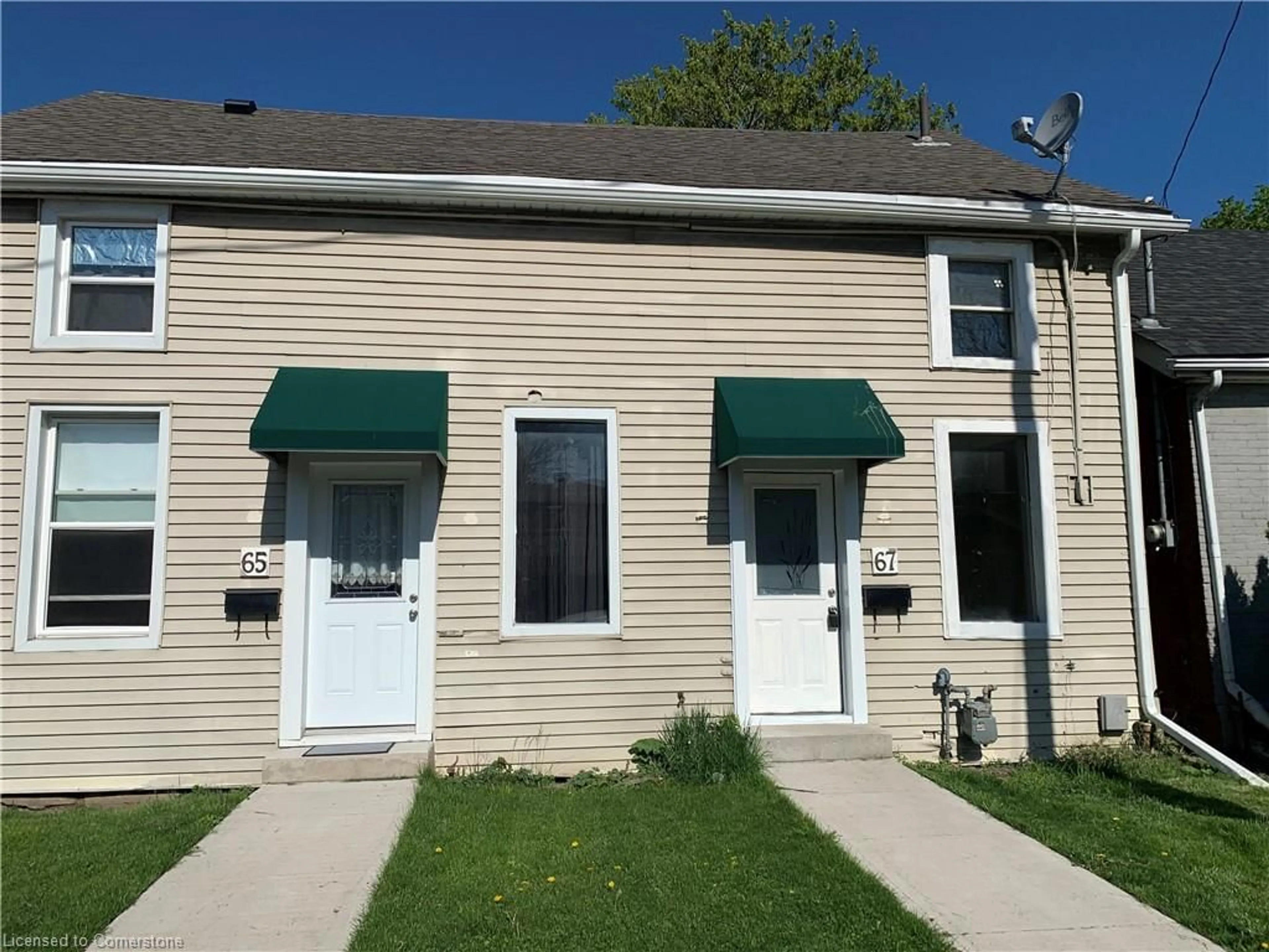 Home with vinyl exterior material, street for 67 Tisdale St, Hamilton Ontario L8L 5M3