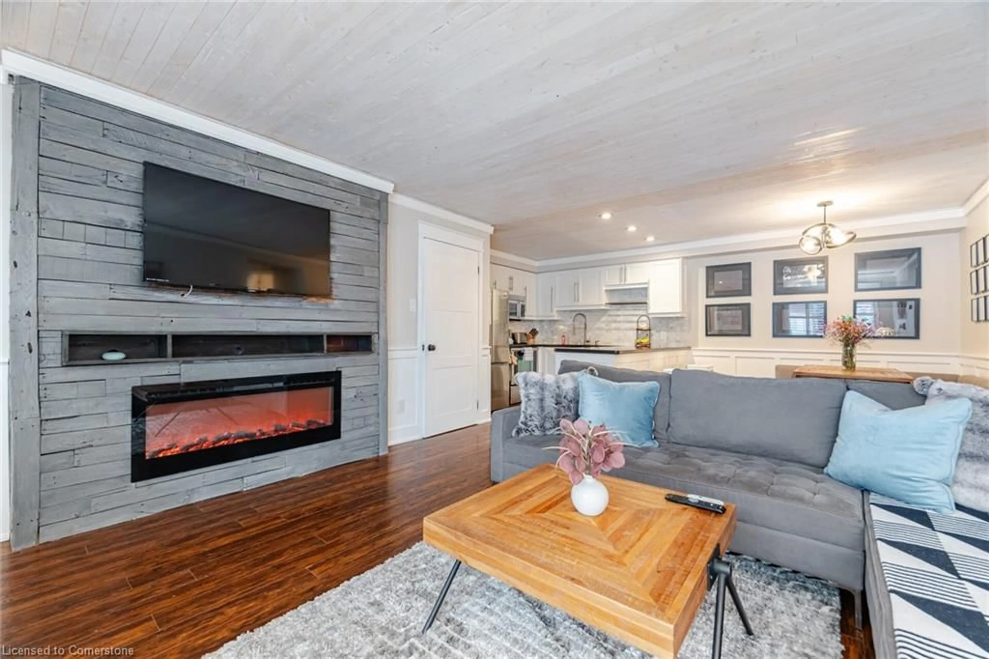 Living room with furniture, wood/laminate floor for 1701 Lampman Ave #701, Burlington Ontario L7L 6R7