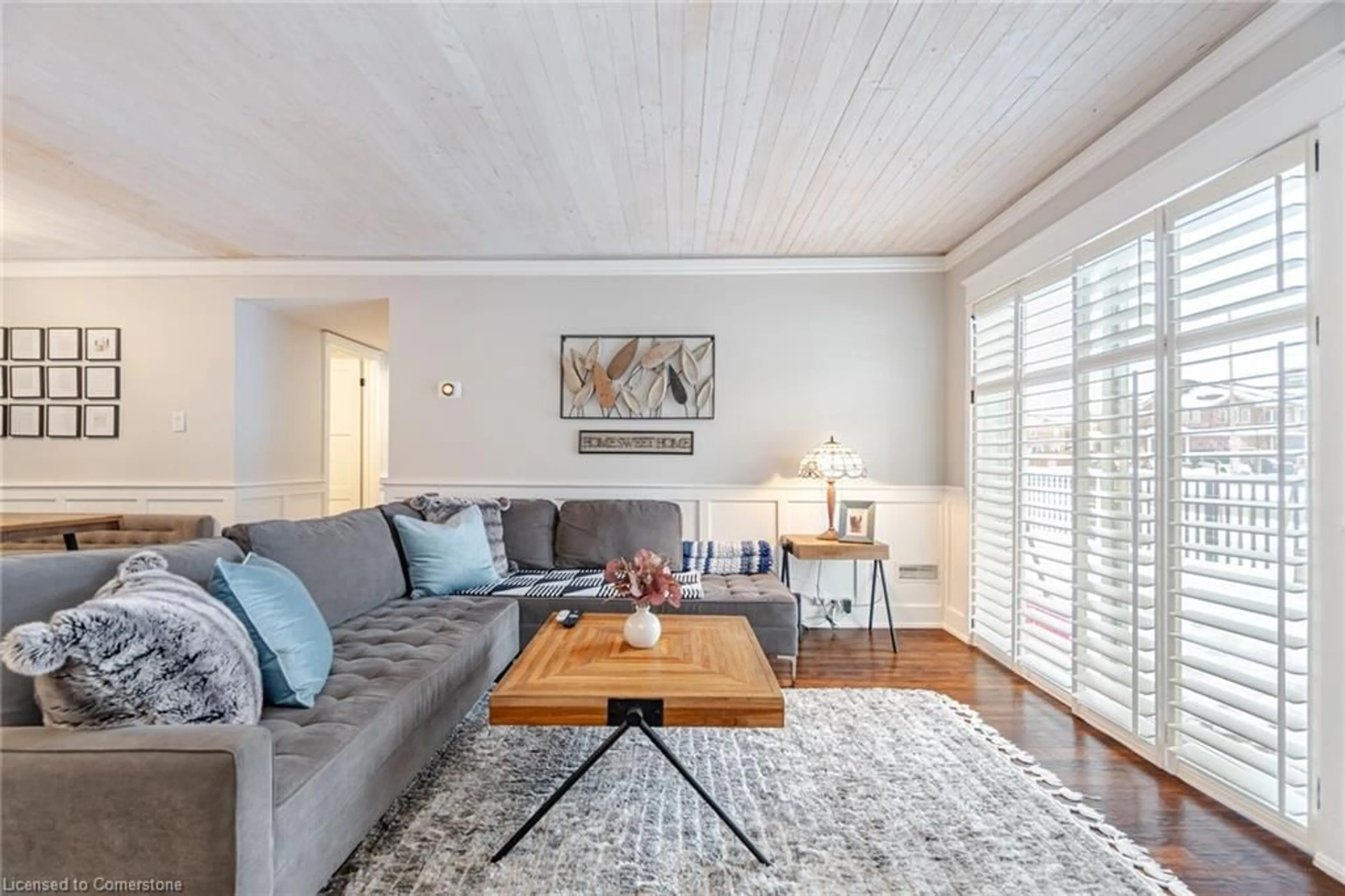 Living room with furniture, wood/laminate floor for 1701 Lampman Ave #701, Burlington Ontario L7L 6R7
