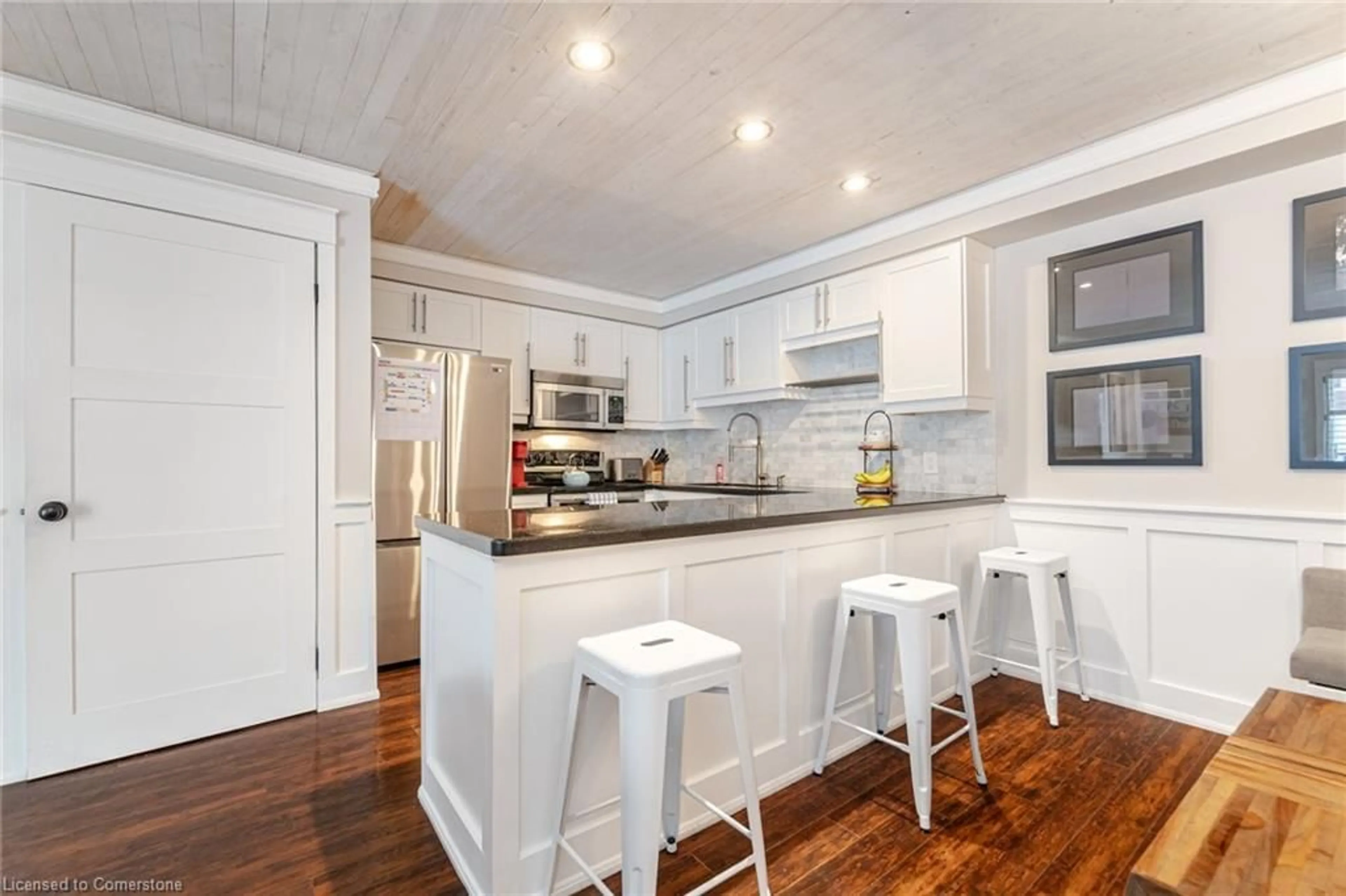 Open concept kitchen, wood/laminate floor for 1701 Lampman Ave #701, Burlington Ontario L7L 6R7