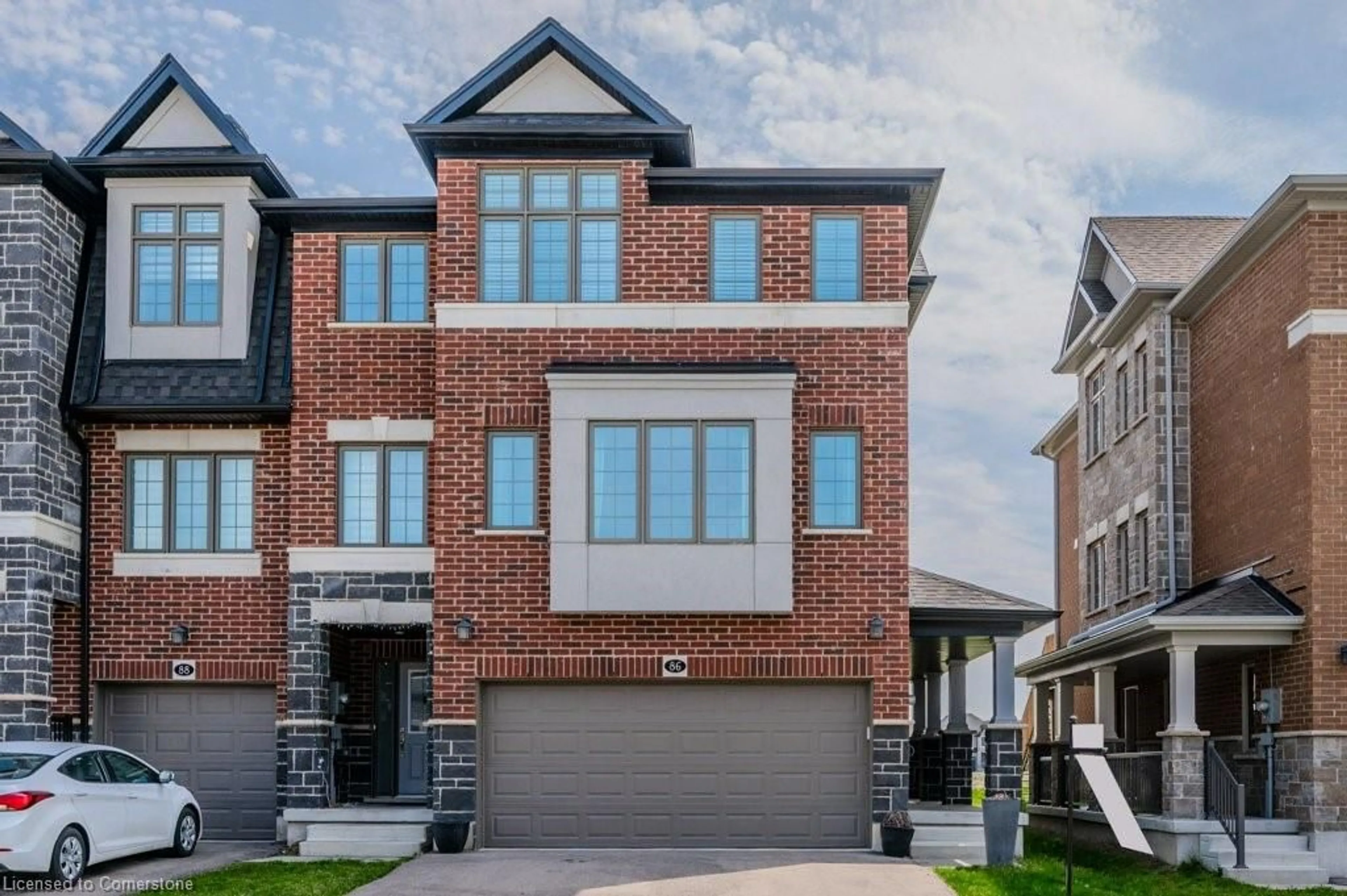 Home with brick exterior material, street for 86 Monarch Woods Dr, Kitchener Ontario N2P 0K1