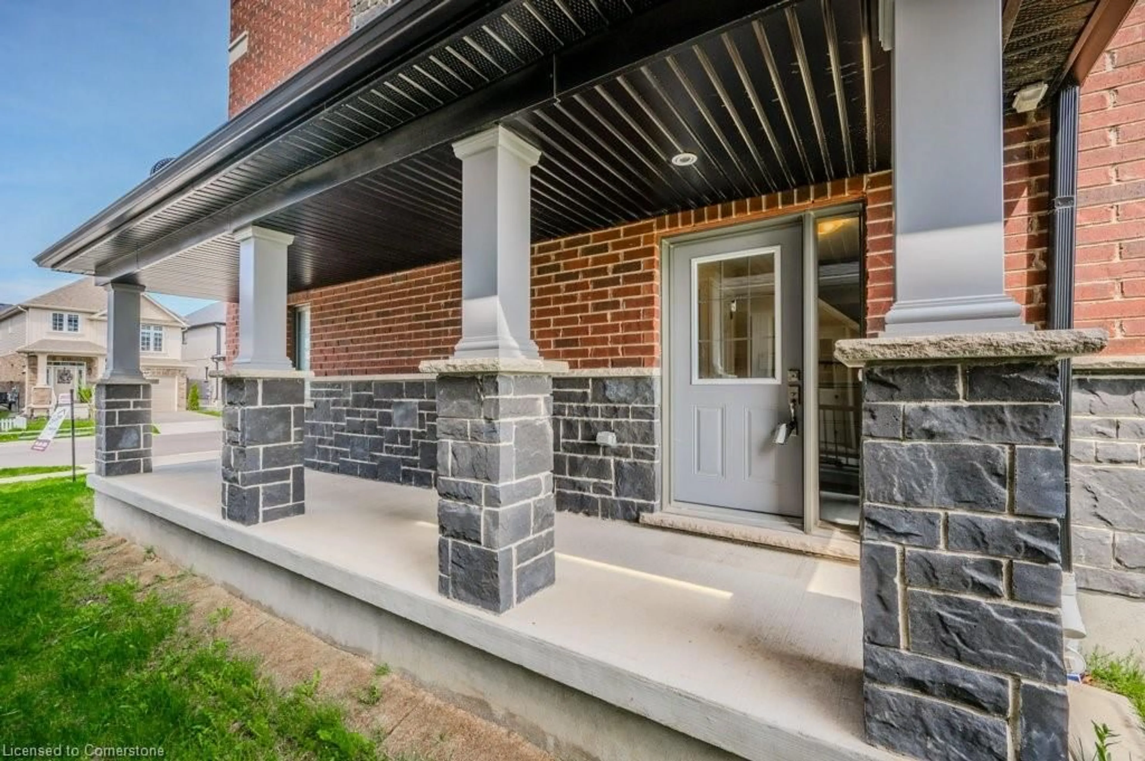 Home with brick exterior material, street for 86 Monarch Woods Dr, Kitchener Ontario N2P 0K1