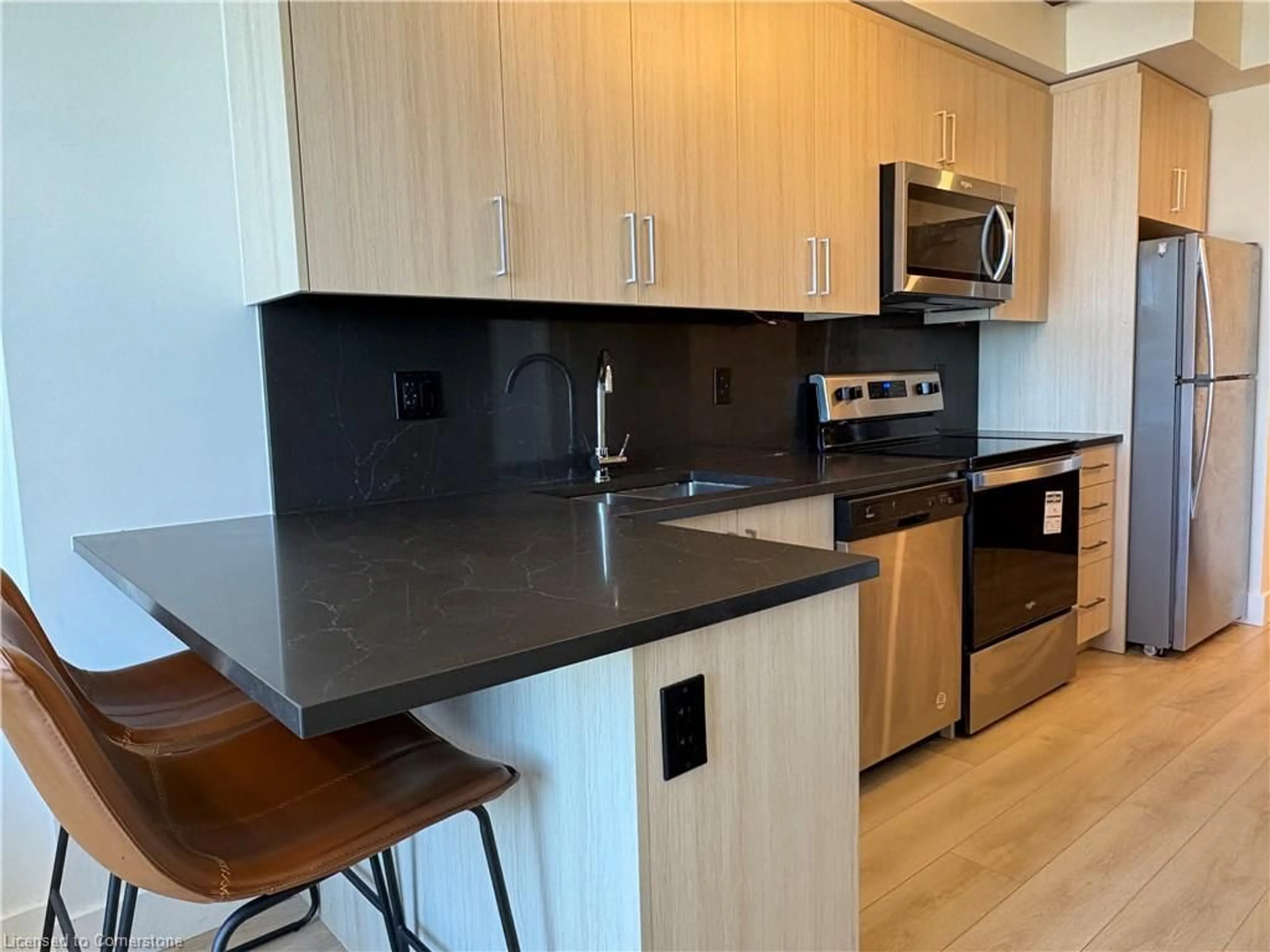 Standard kitchen, wood/laminate floor for 145 Columbia St #1402, Waterloo Ontario N2L 0K7