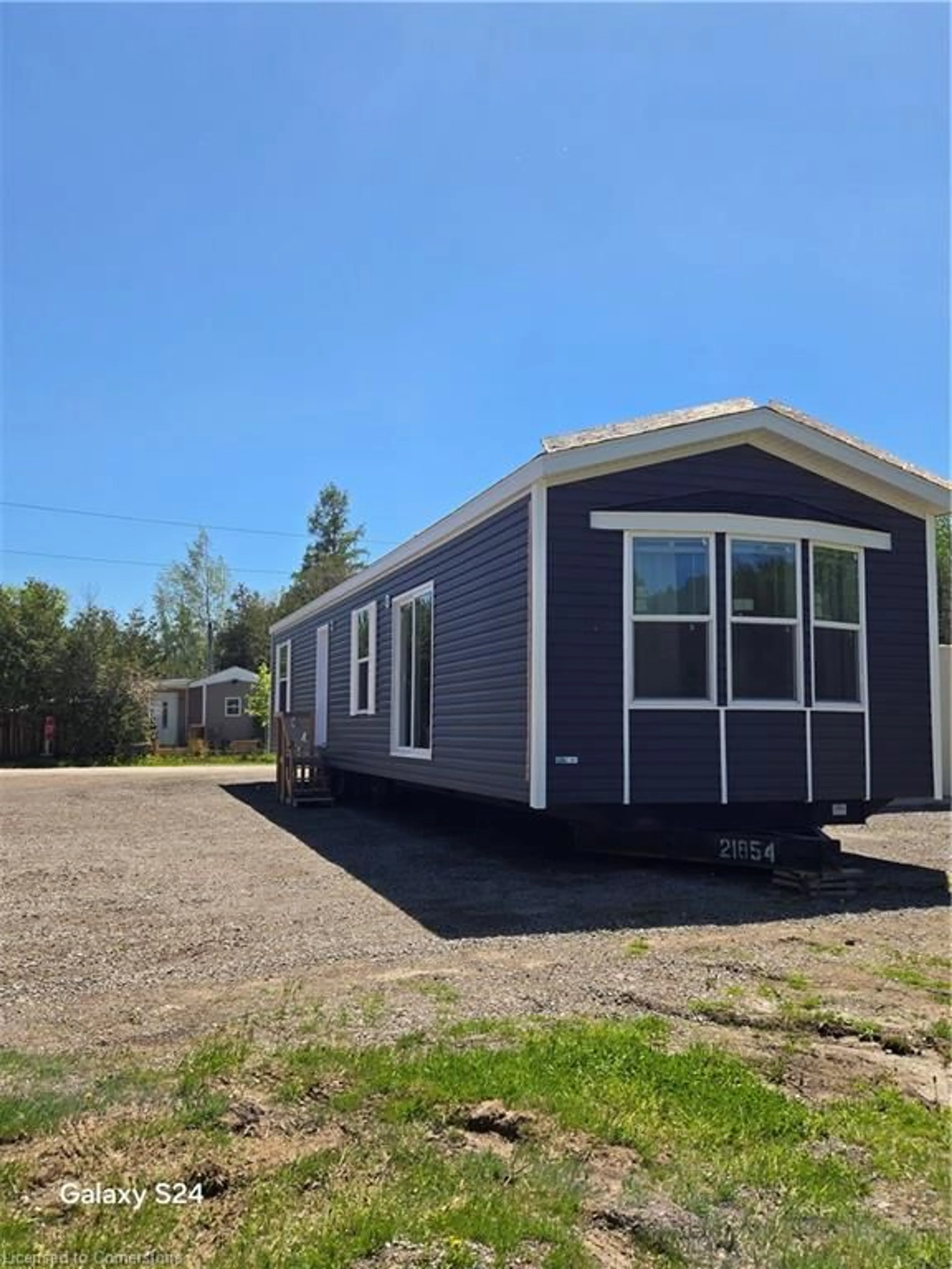 Home with vinyl exterior material, street for 1085 Concession 10 Rd #23, Flamborough Ontario N0B 2J0