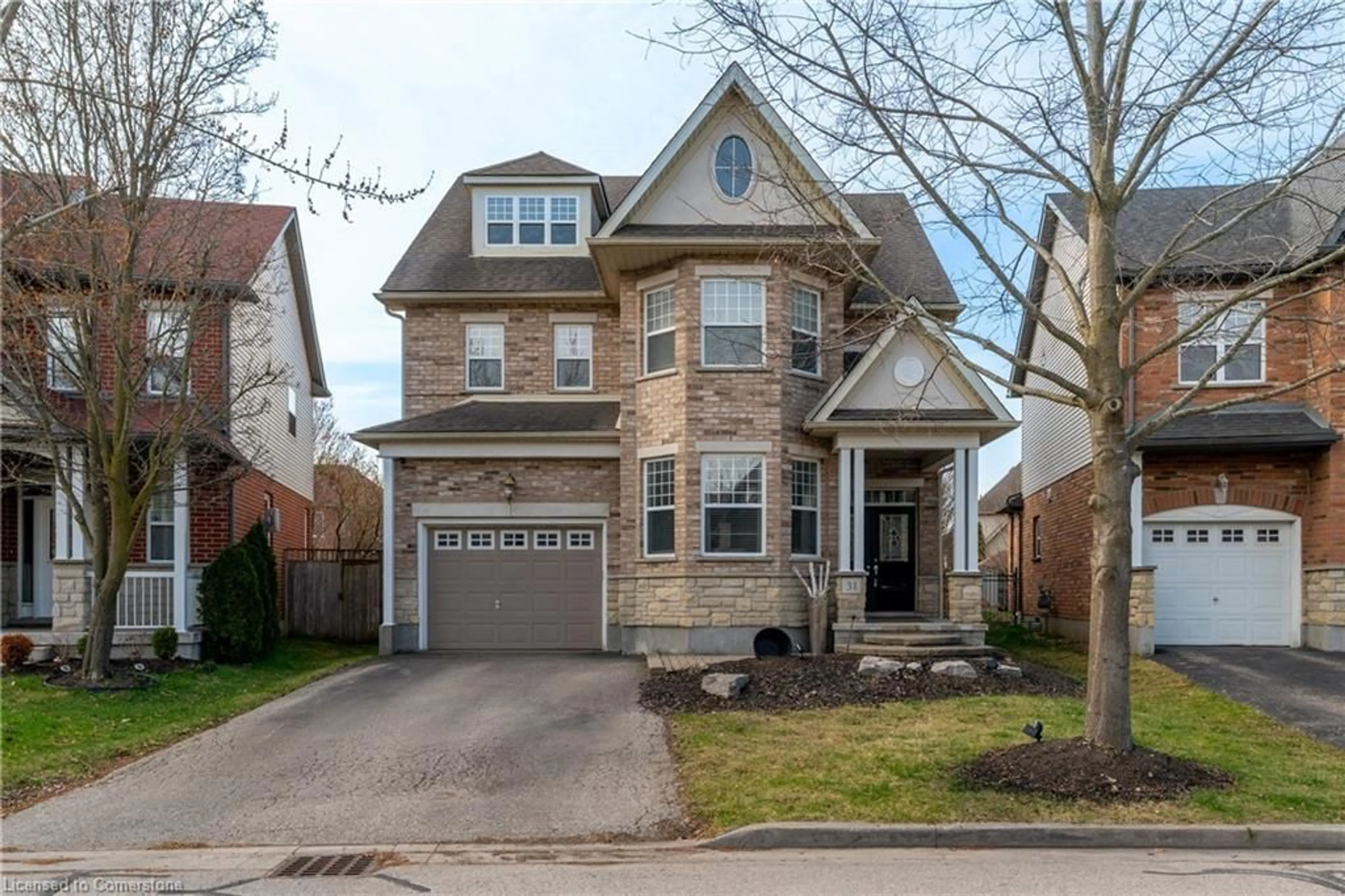 Home with brick exterior material, street for 31 Coopershawk St, Kitchener Ontario N2K 4J7