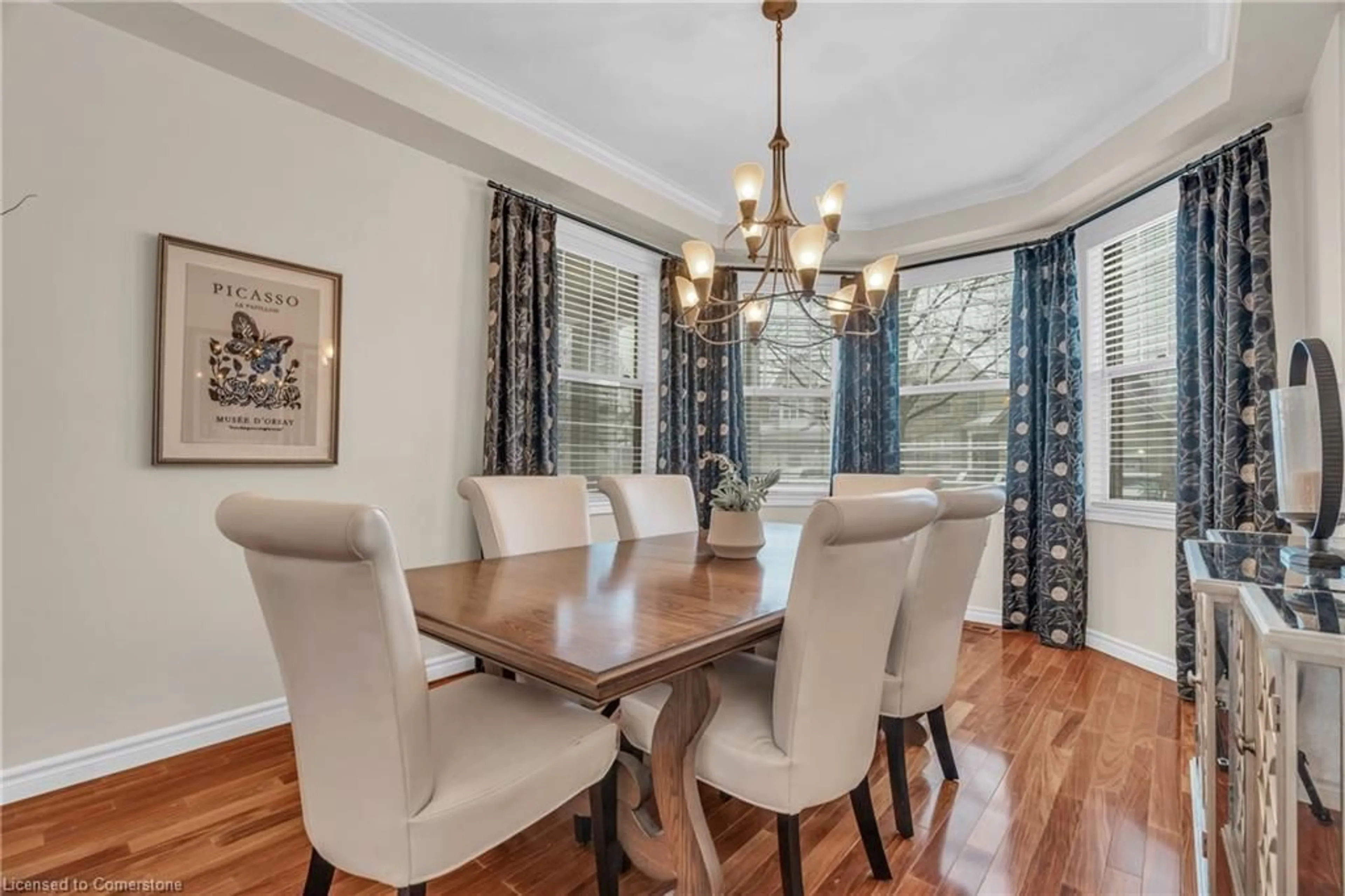 Dining room, wood/laminate floor for 31 Coopershawk St, Kitchener Ontario N2K 4J7