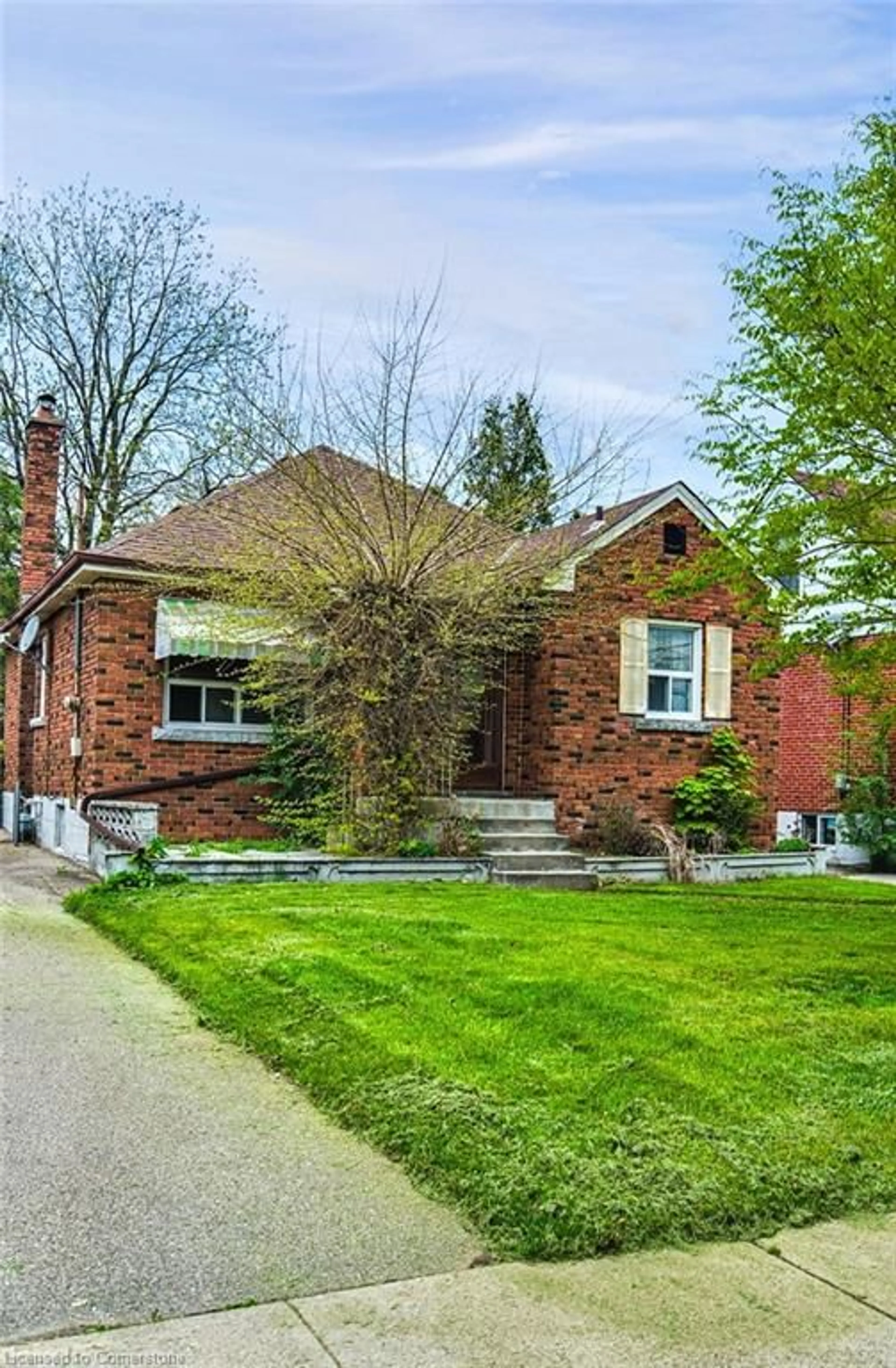 Home with brick exterior material, street for 48 Woodbridge Rd, Hamilton Ontario L8K 3C9
