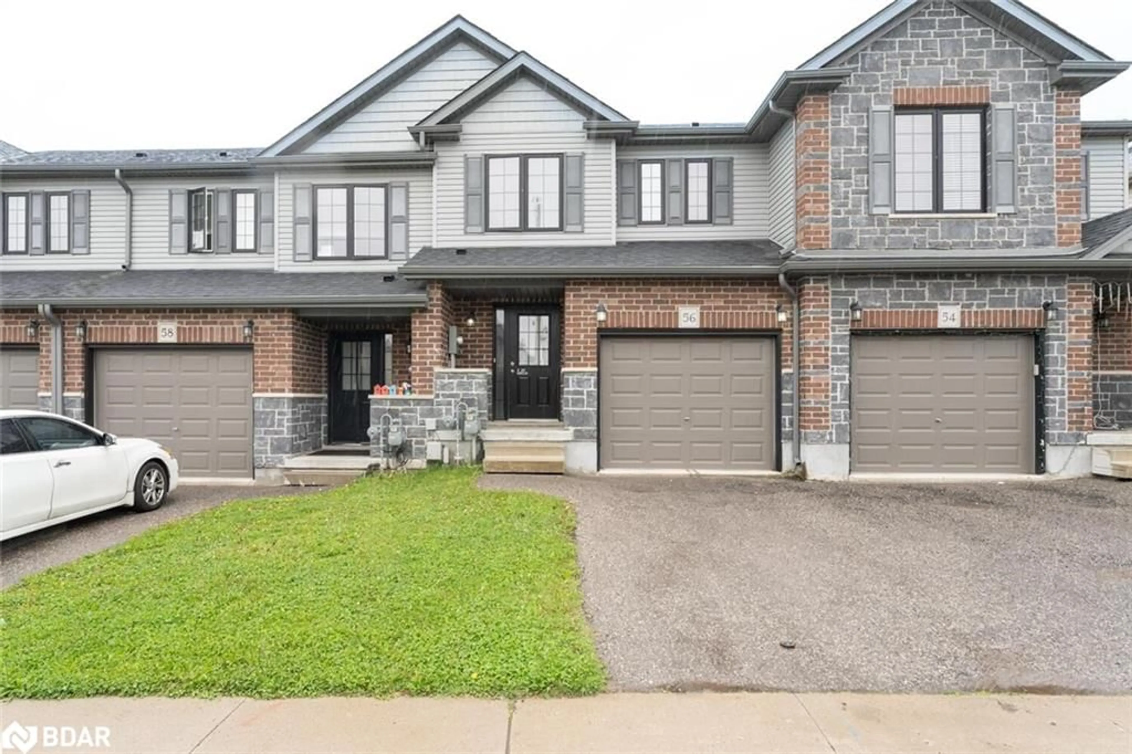 Home with brick exterior material, street for 56 Honey St, Cambridge Ontario N1T 2C9