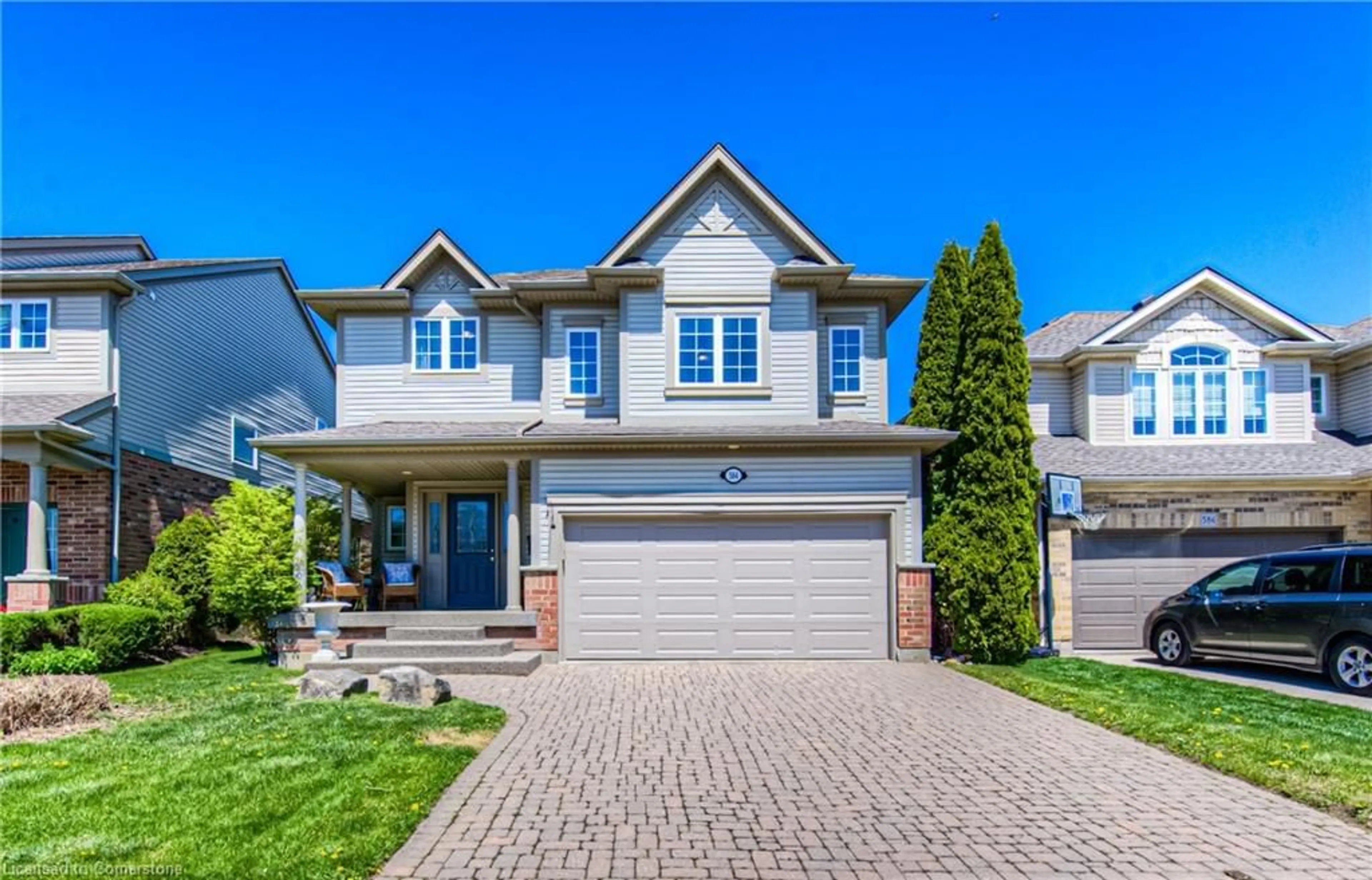 Home with brick exterior material, street for 584 New Bedford Dr, Waterloo Ontario N2K 4H5