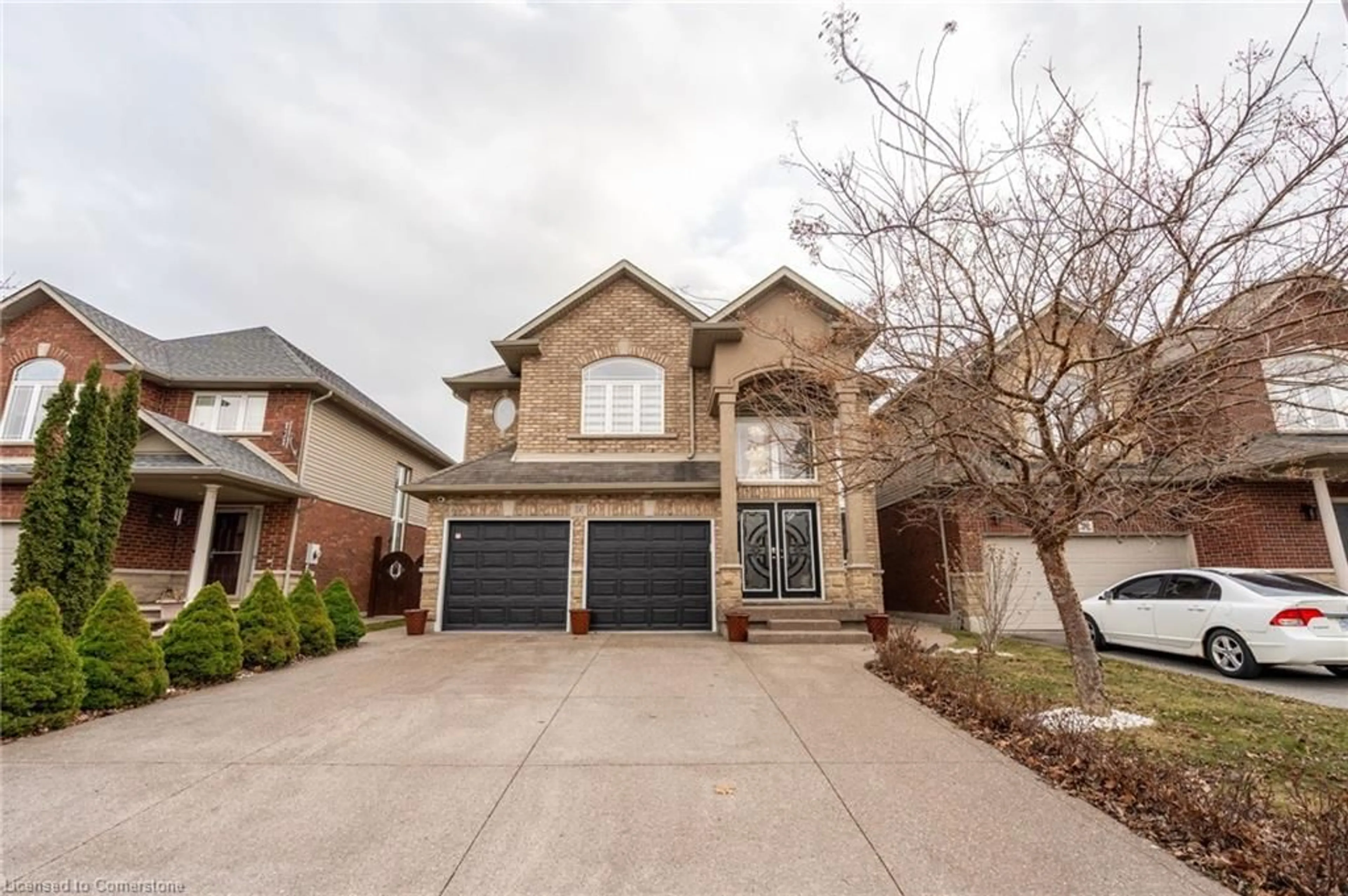 Home with brick exterior material, street for 36 Showcase Dr, Hamilton Ontario L0R 1P0