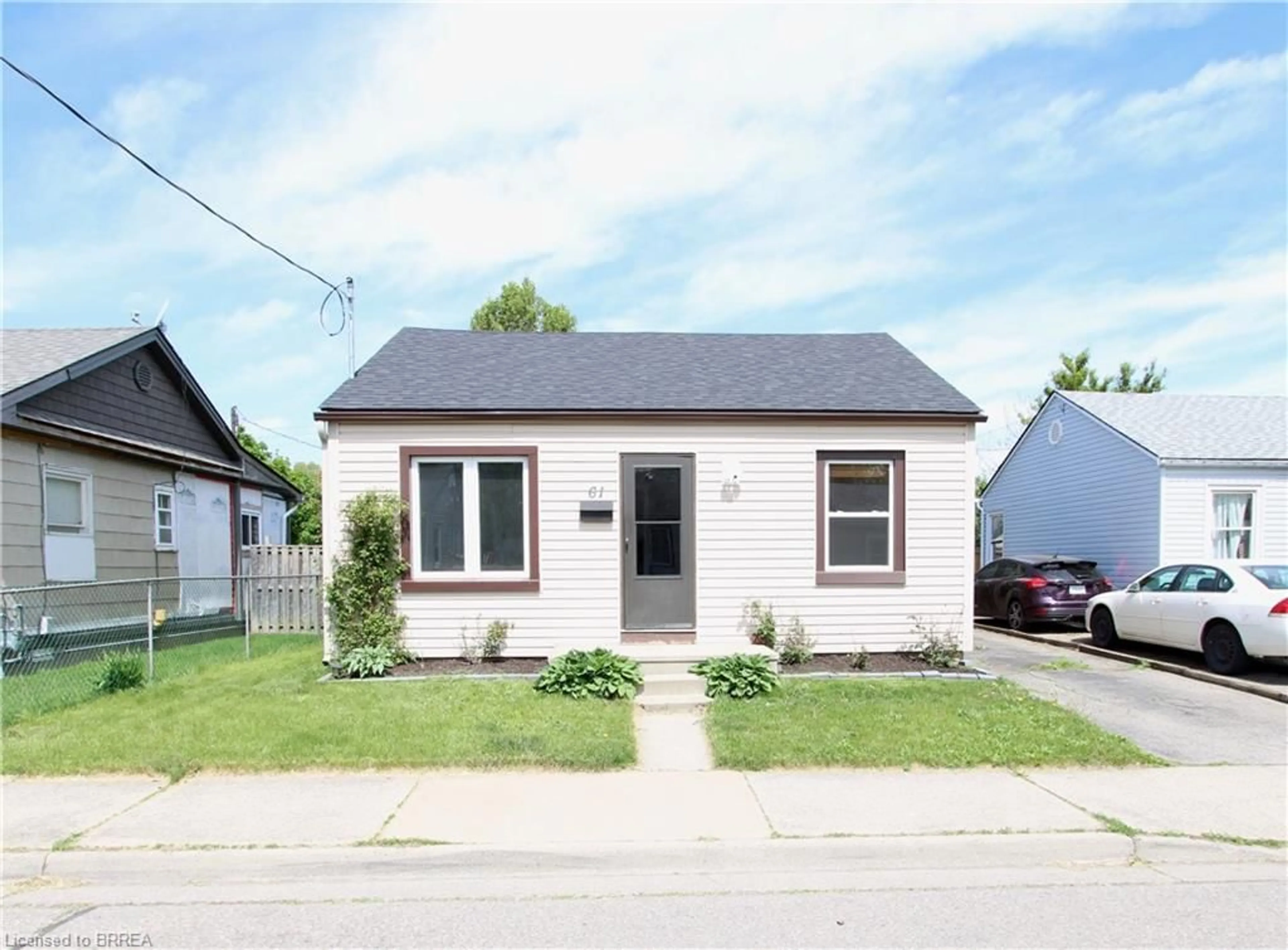 Home with brick exterior material, street for 61 Ninth Ave, Brantford Ontario N3S 1E3