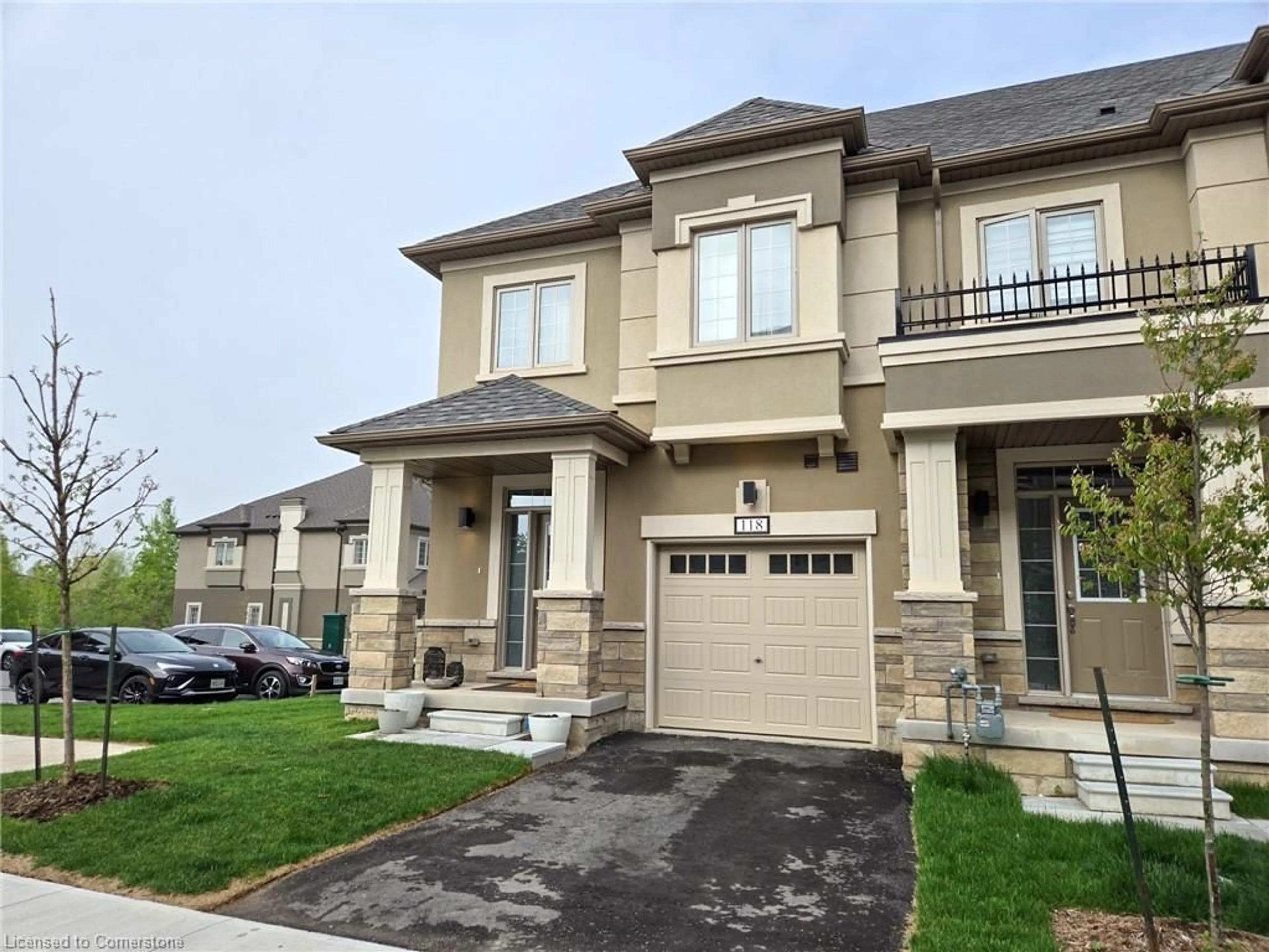 Home with brick exterior material, street for 305 Garner Rd #118, Ancaster Ontario L9G 3K9