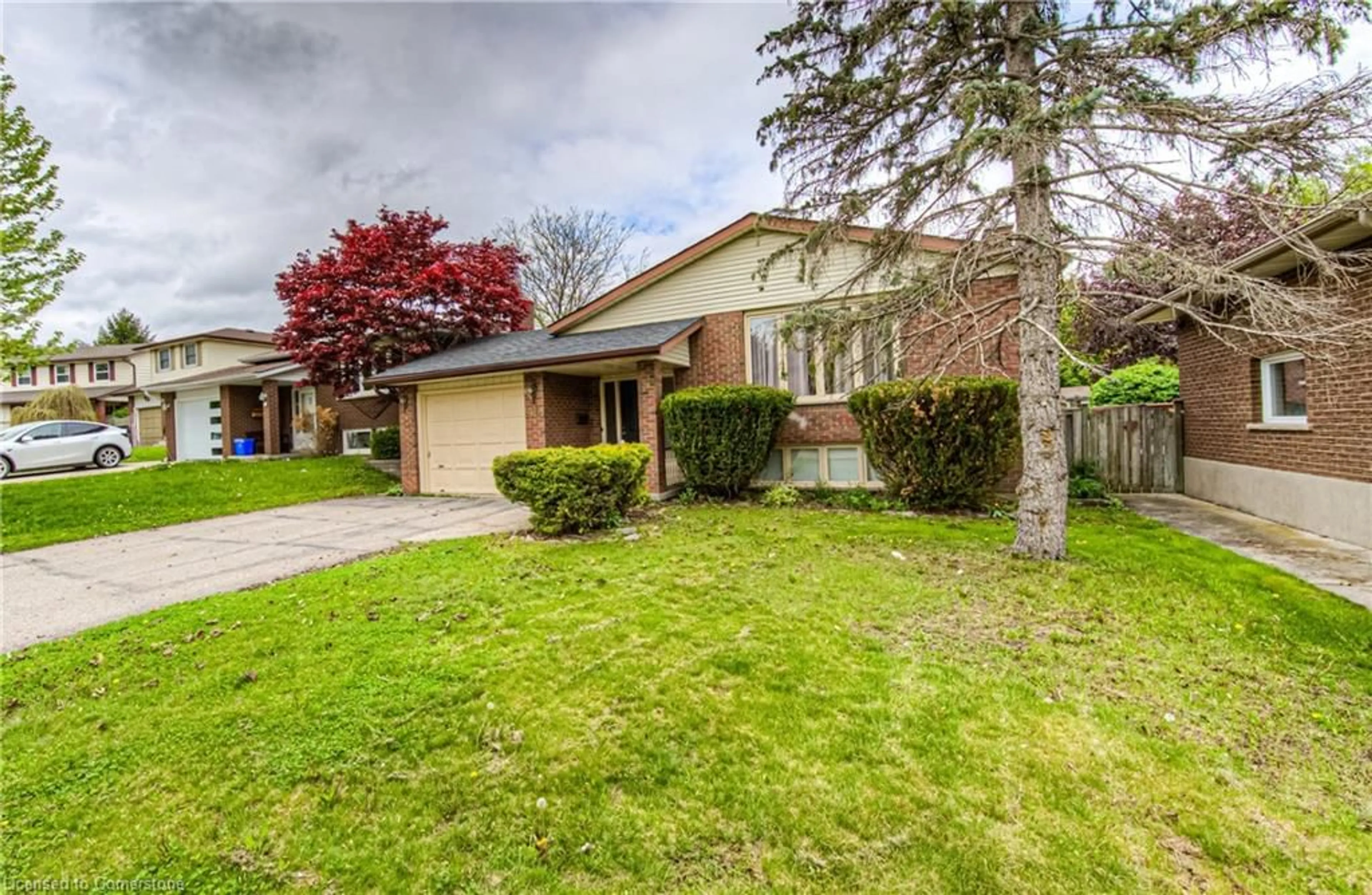 Home with brick exterior material, street for 46 Orchard Mill Cres, Kitchener Ontario N2P 1T2