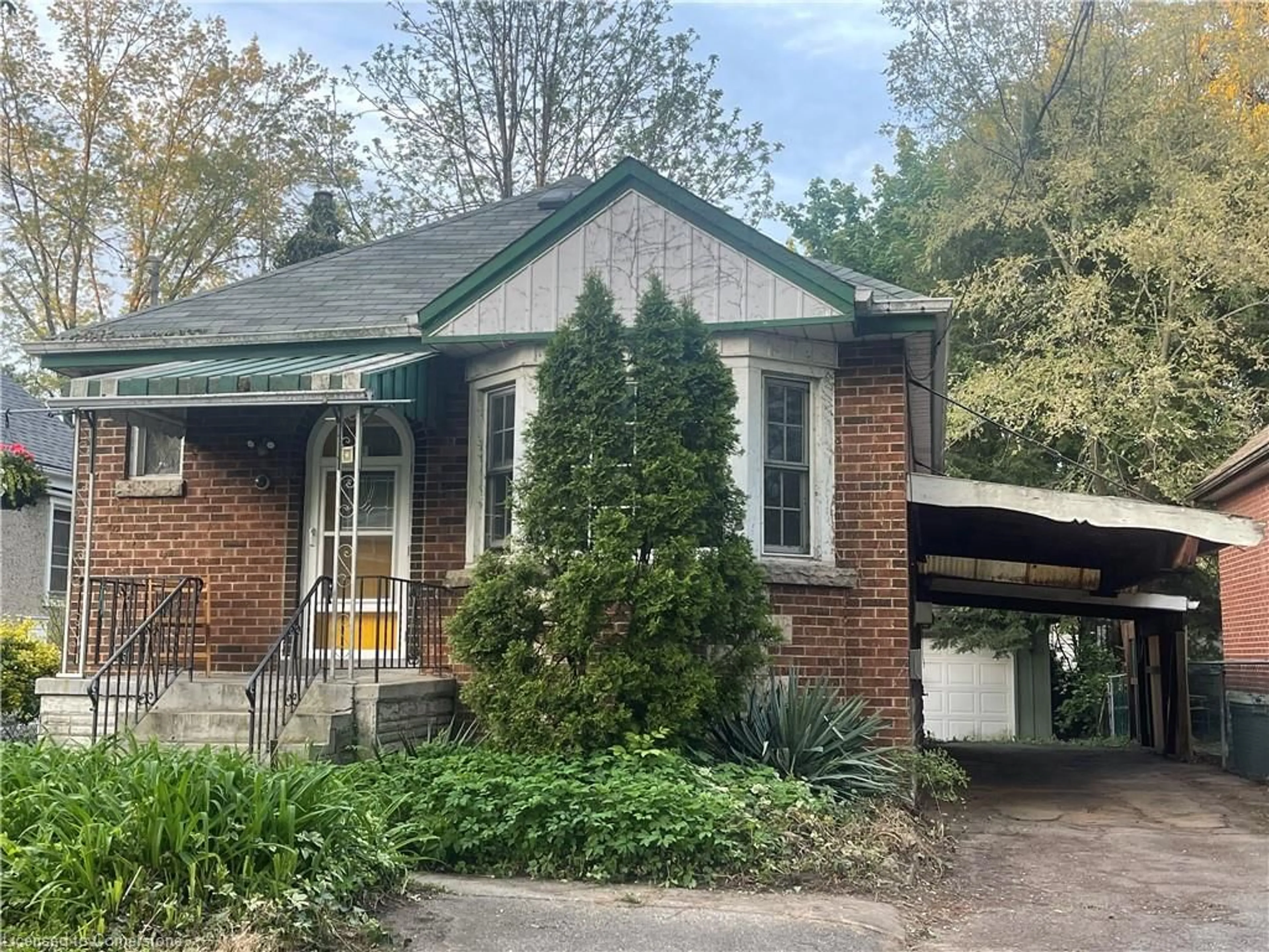 Home with brick exterior material, street for 14 Hollywood St, Hamilton Ontario L8S 3K6