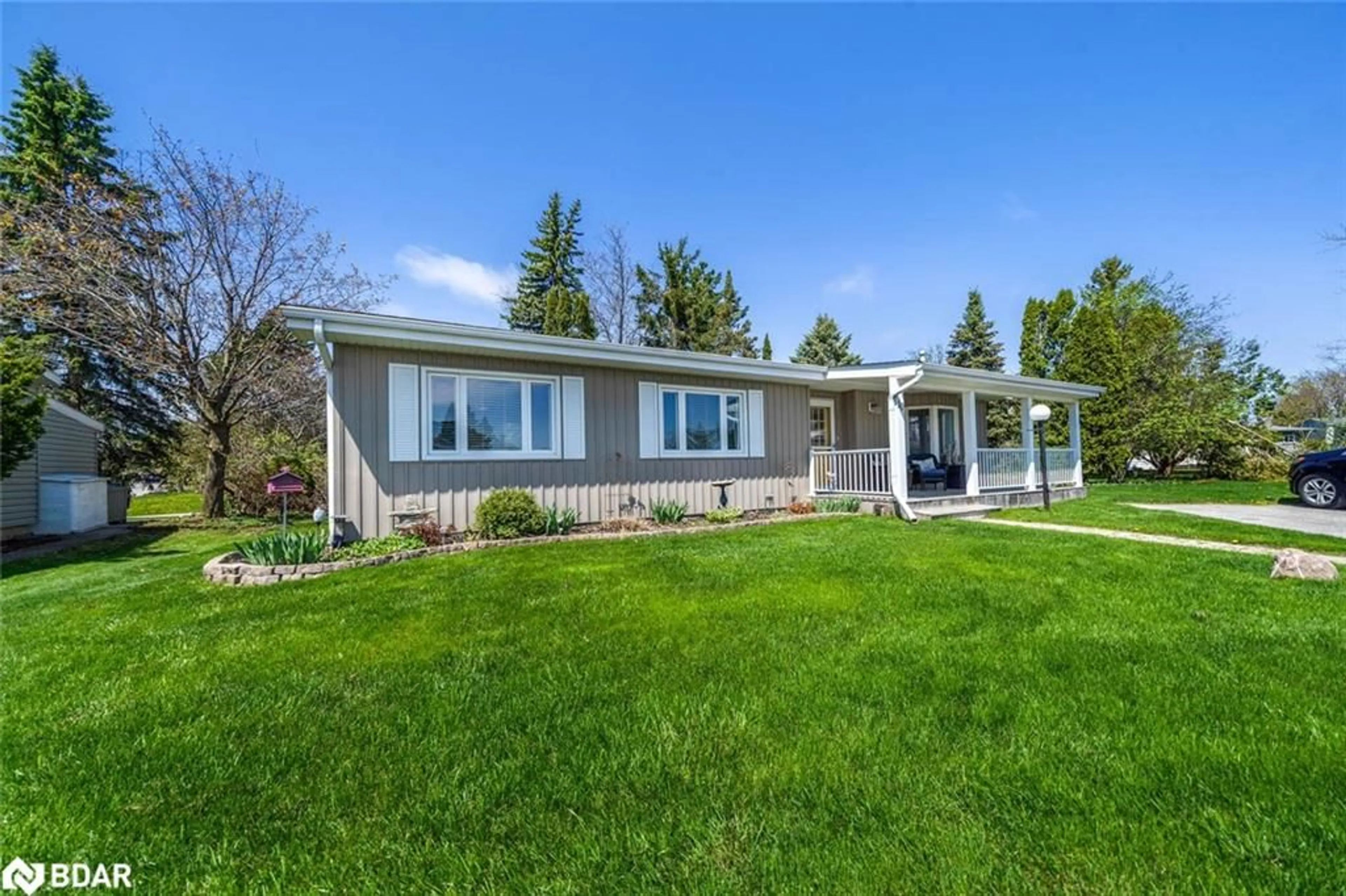 Home with vinyl exterior material, street for 10 Carmans Cove, Innisville Ontario L9S 1N7
