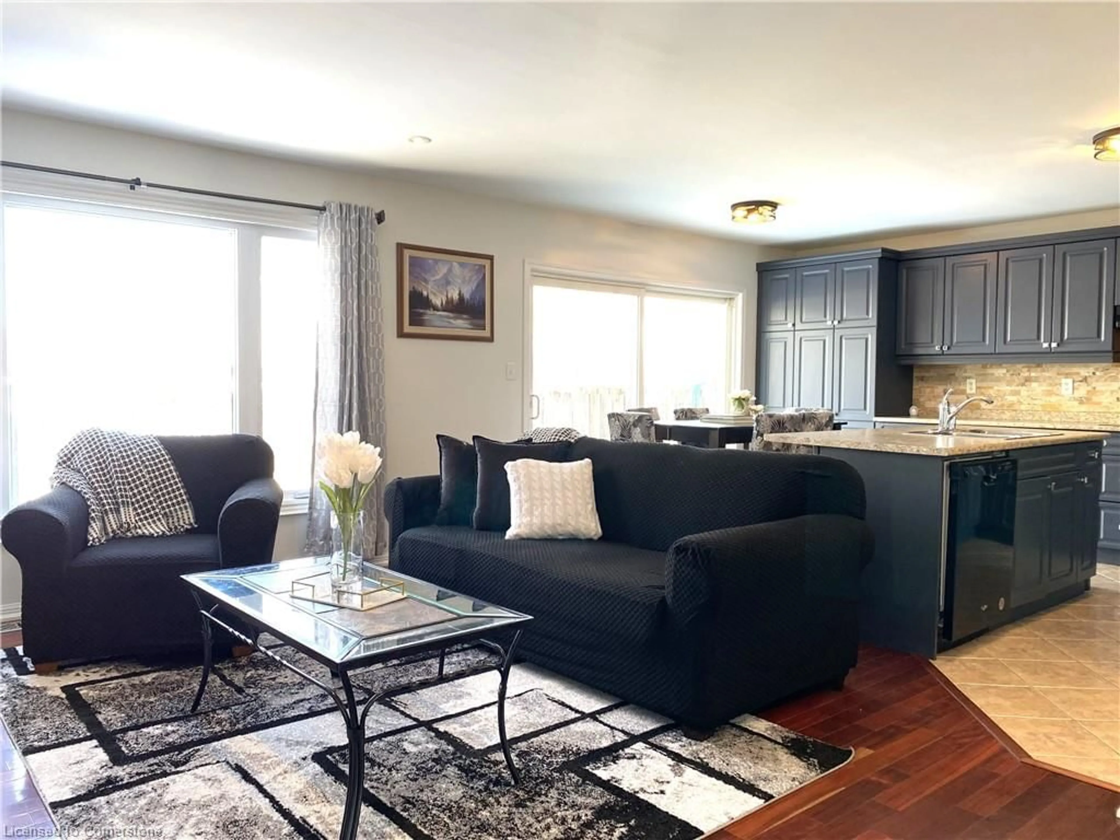 Living room with furniture, wood/laminate floor for 78 John W Taylor Ave, Alliston Ontario L9R 0C9