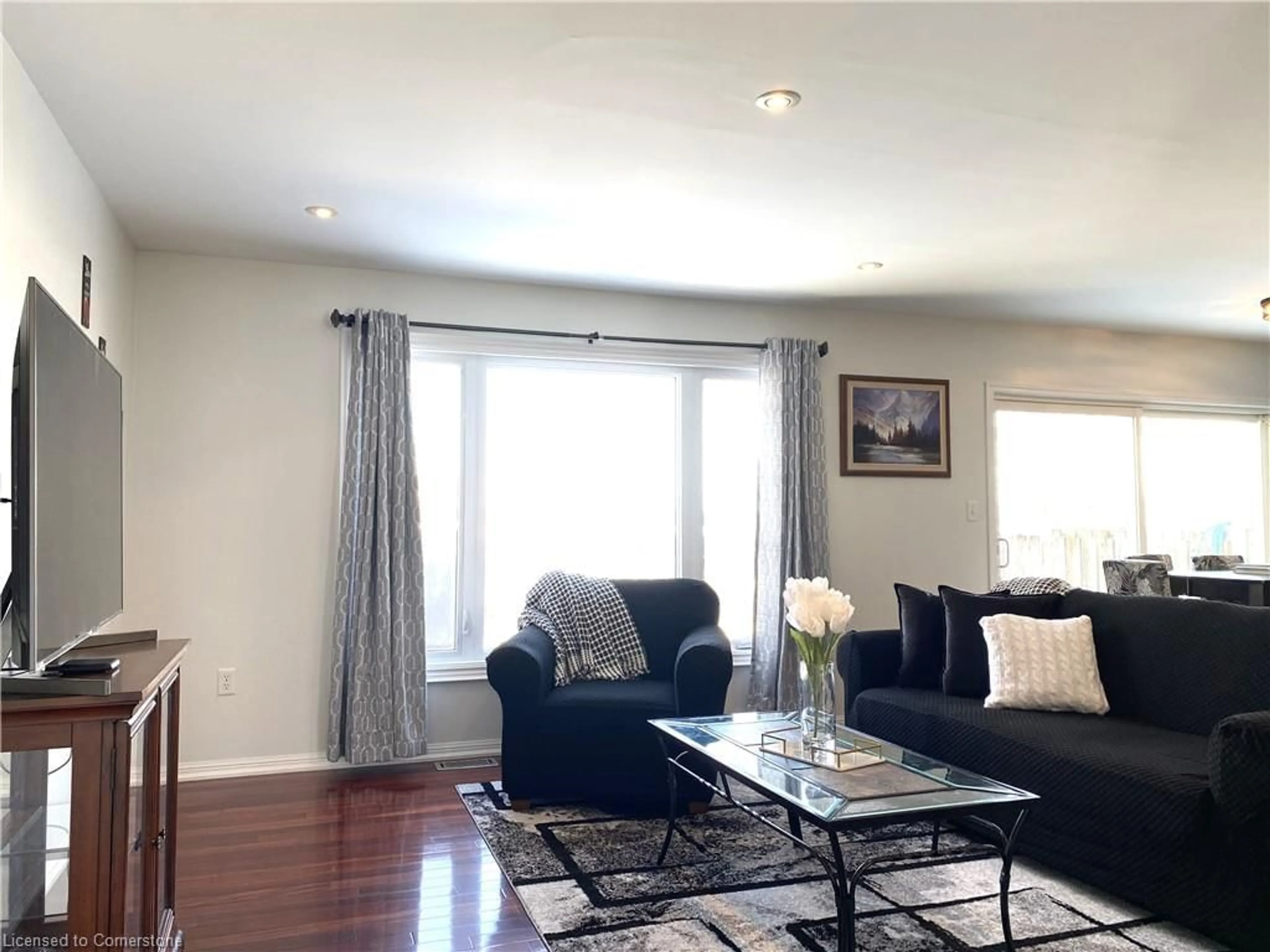 Living room with furniture, wood/laminate floor for 78 John W Taylor Ave, Alliston Ontario L9R 0C9