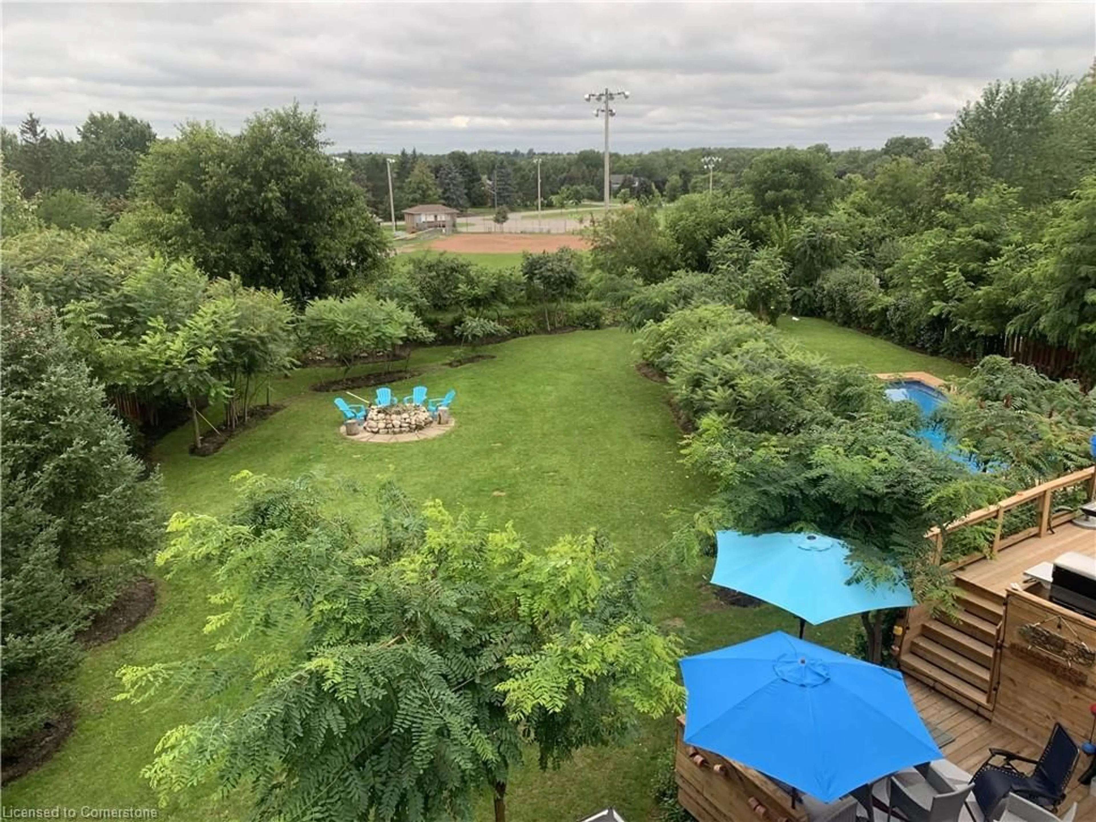 A pic from outside/outdoor area/front of a property/back of a property/a pic from drone, forest/trees view for 13 Ellen St, Freelton Ontario L8B 0Z5