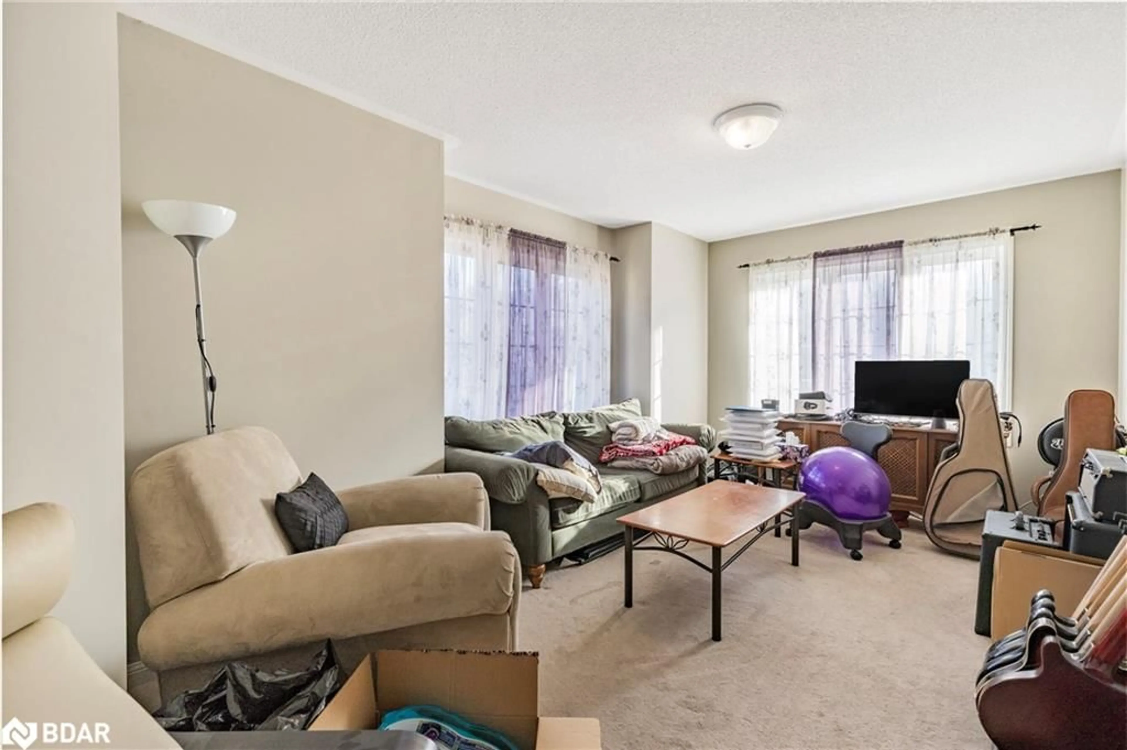 Living room with furniture, carpet floor for 454 Beach Blvd #20, Hamilton Ontario L8H 6X1