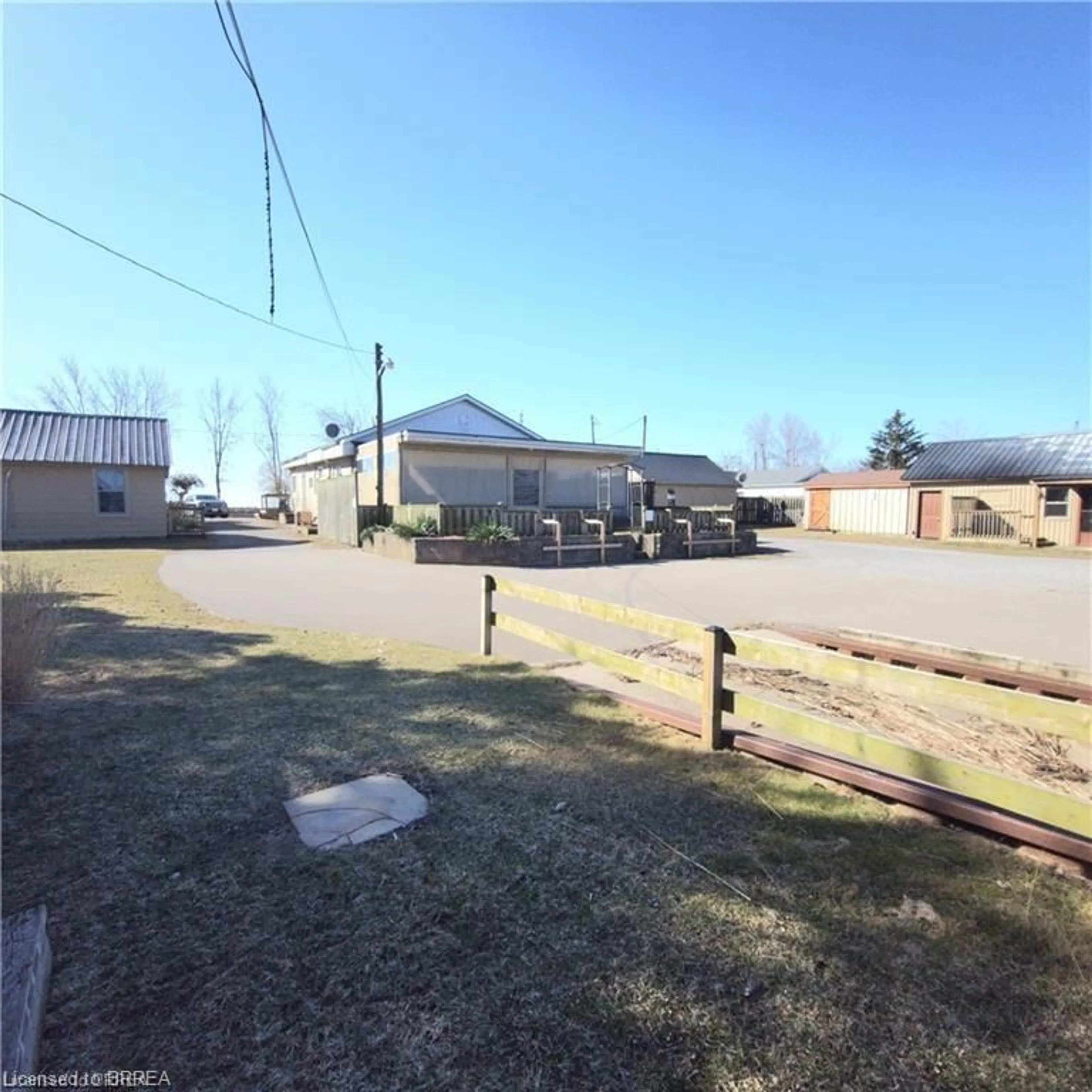A pic from outside/outdoor area/front of a property/back of a property/a pic from drone, street for 48-50 Erie Blvd, Long Point Ontario N0E 1M0