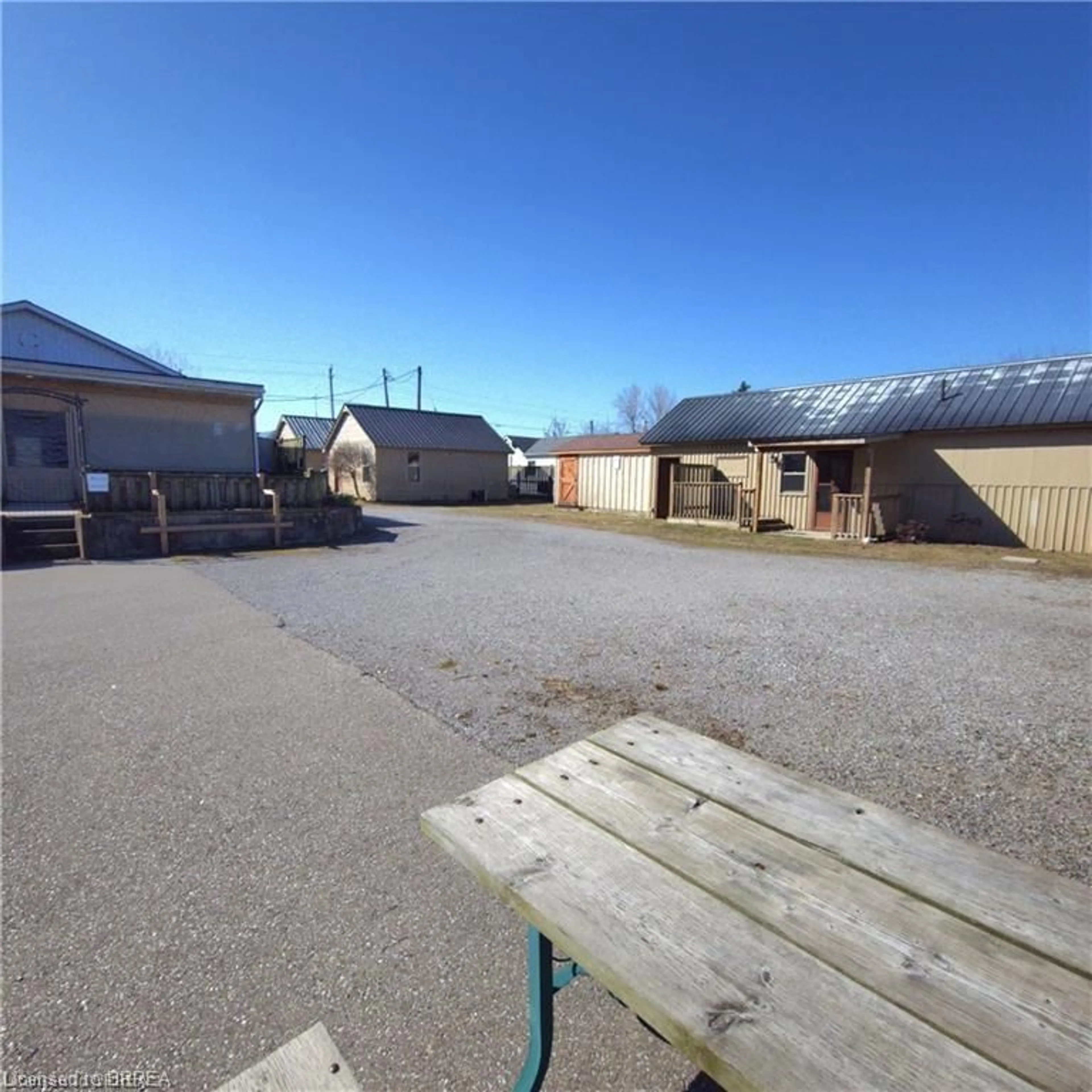 A pic from outside/outdoor area/front of a property/back of a property/a pic from drone, street for 48-50 Erie Blvd, Long Point Ontario N0E 1M0