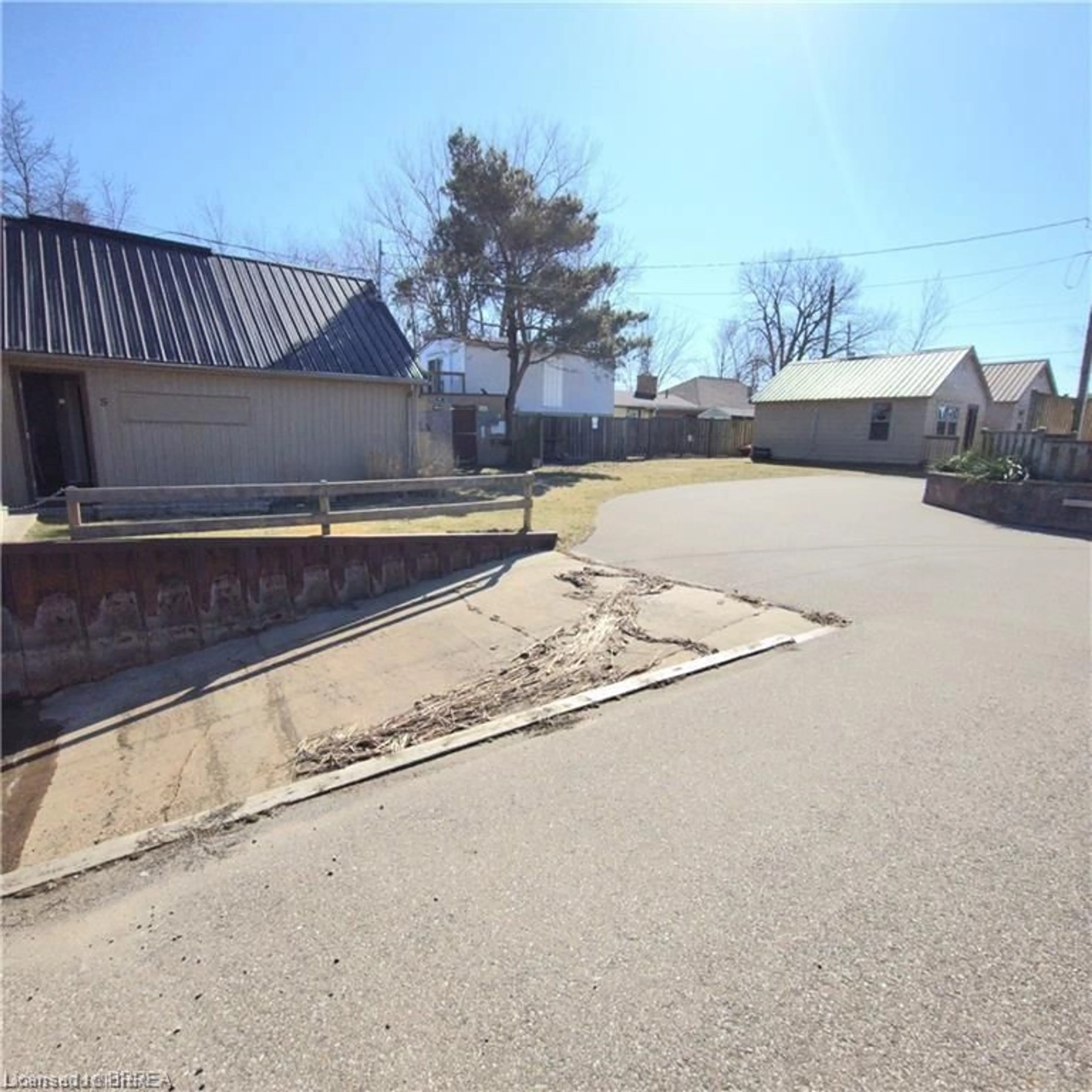 A pic from outside/outdoor area/front of a property/back of a property/a pic from drone, street for 48-50 Erie Blvd, Long Point Ontario N0E 1M0