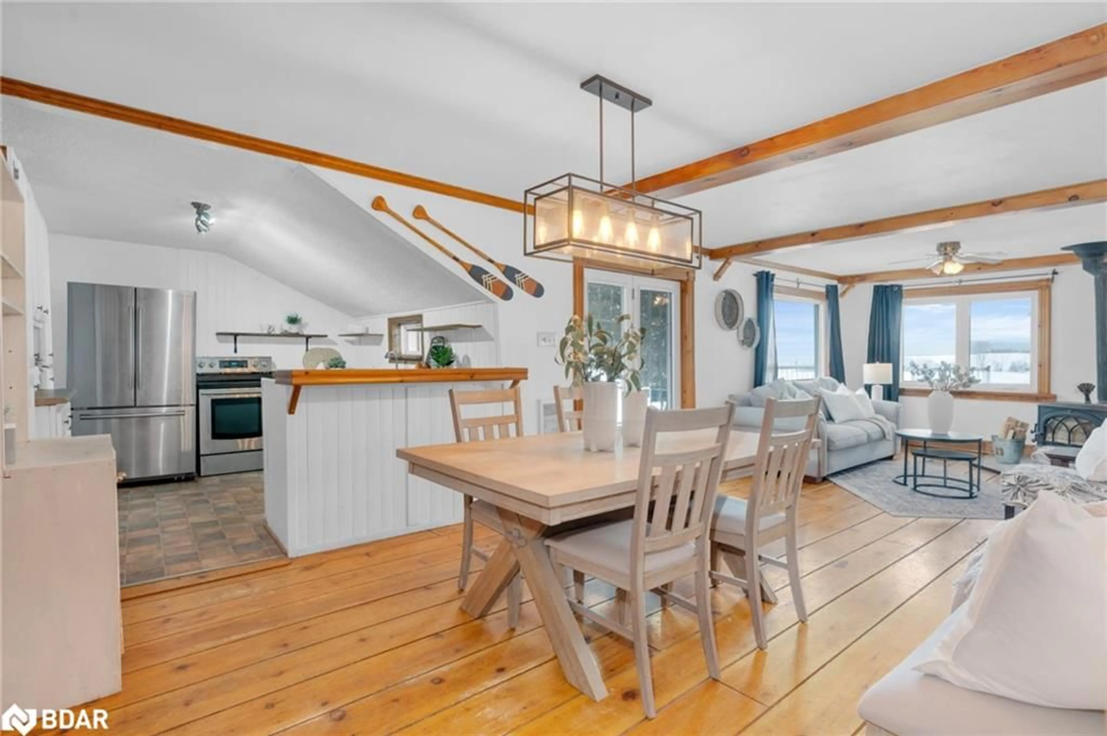 Open concept kitchen, wood/laminate floor for 1424 Klondike Pk Rd, Stayner Ontario L0M 1S0