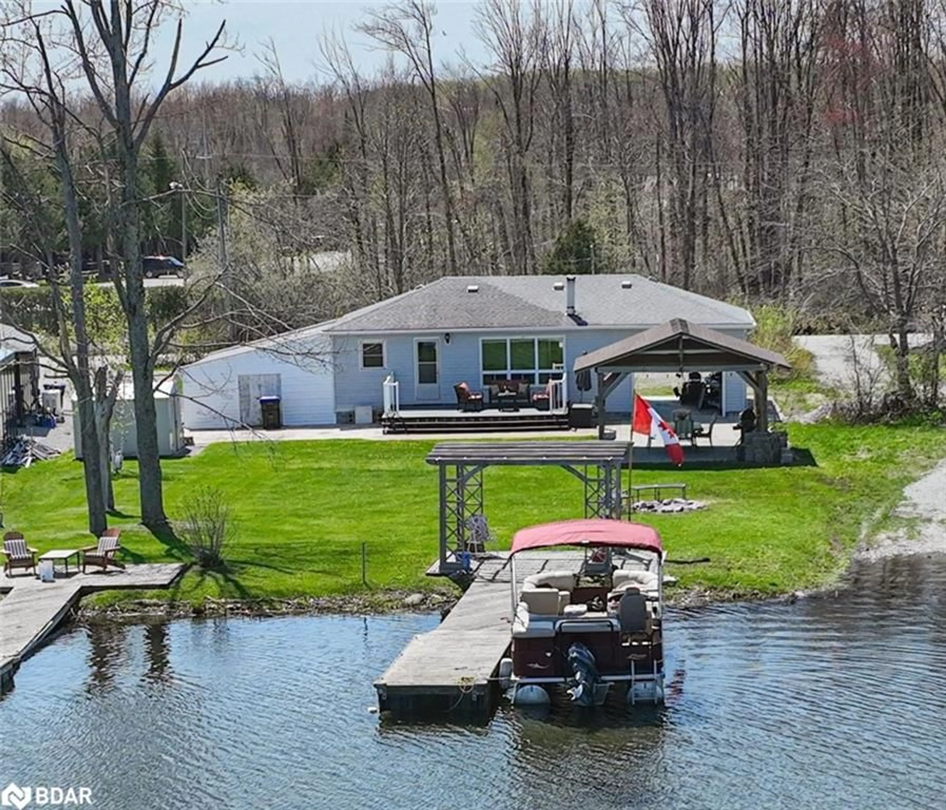 A pic from outside/outdoor area/front of a property/back of a property/a pic from drone, water/lake/river/ocean view for 4137 Bayview Ave, Orillia Ontario L3V 6H7