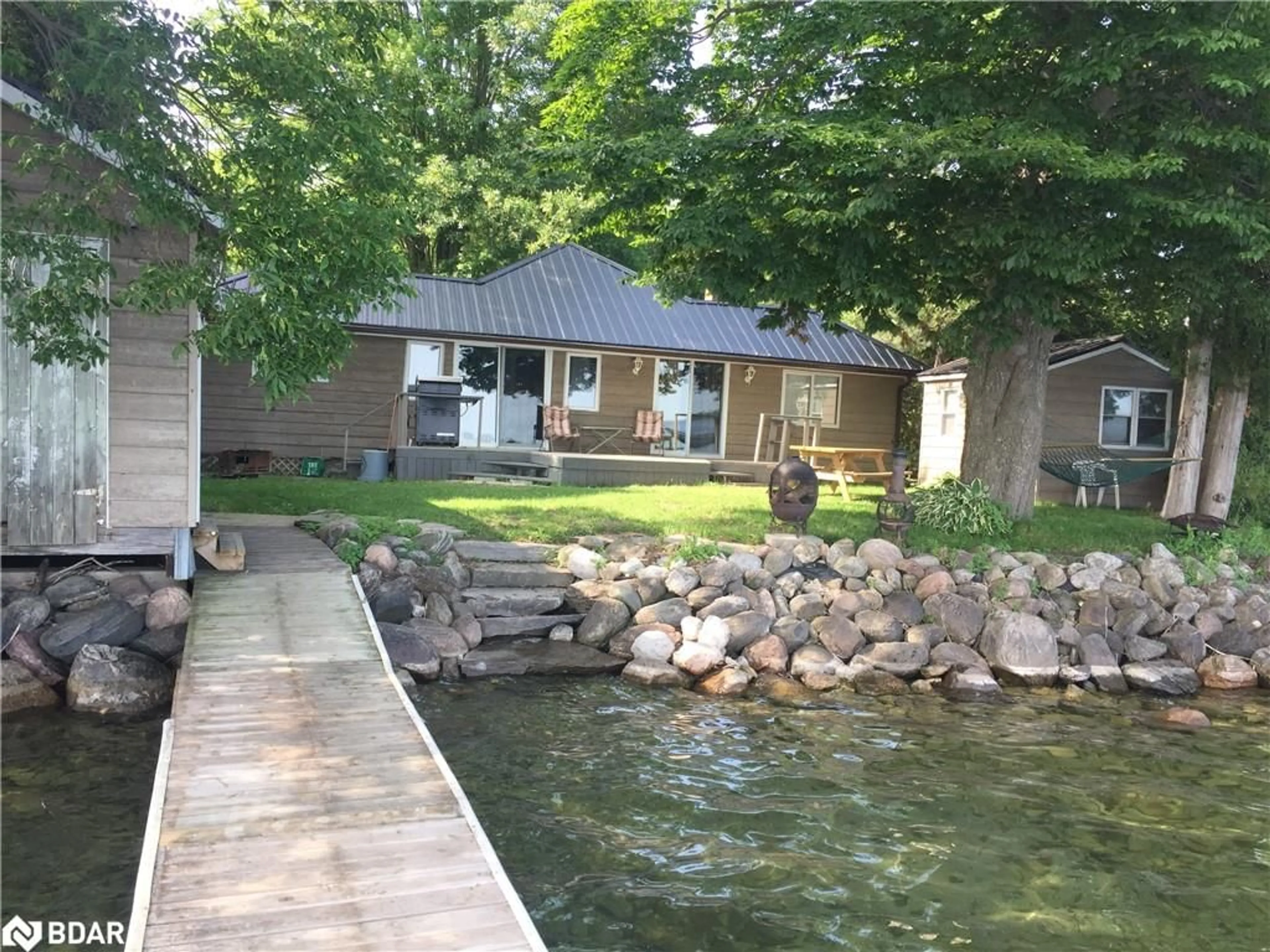 A pic from outside/outdoor area/front of a property/back of a property/a pic from drone, water/lake/river/ocean view for 4705 Anderson Ave, Ramara Ontario L3V 6H7
