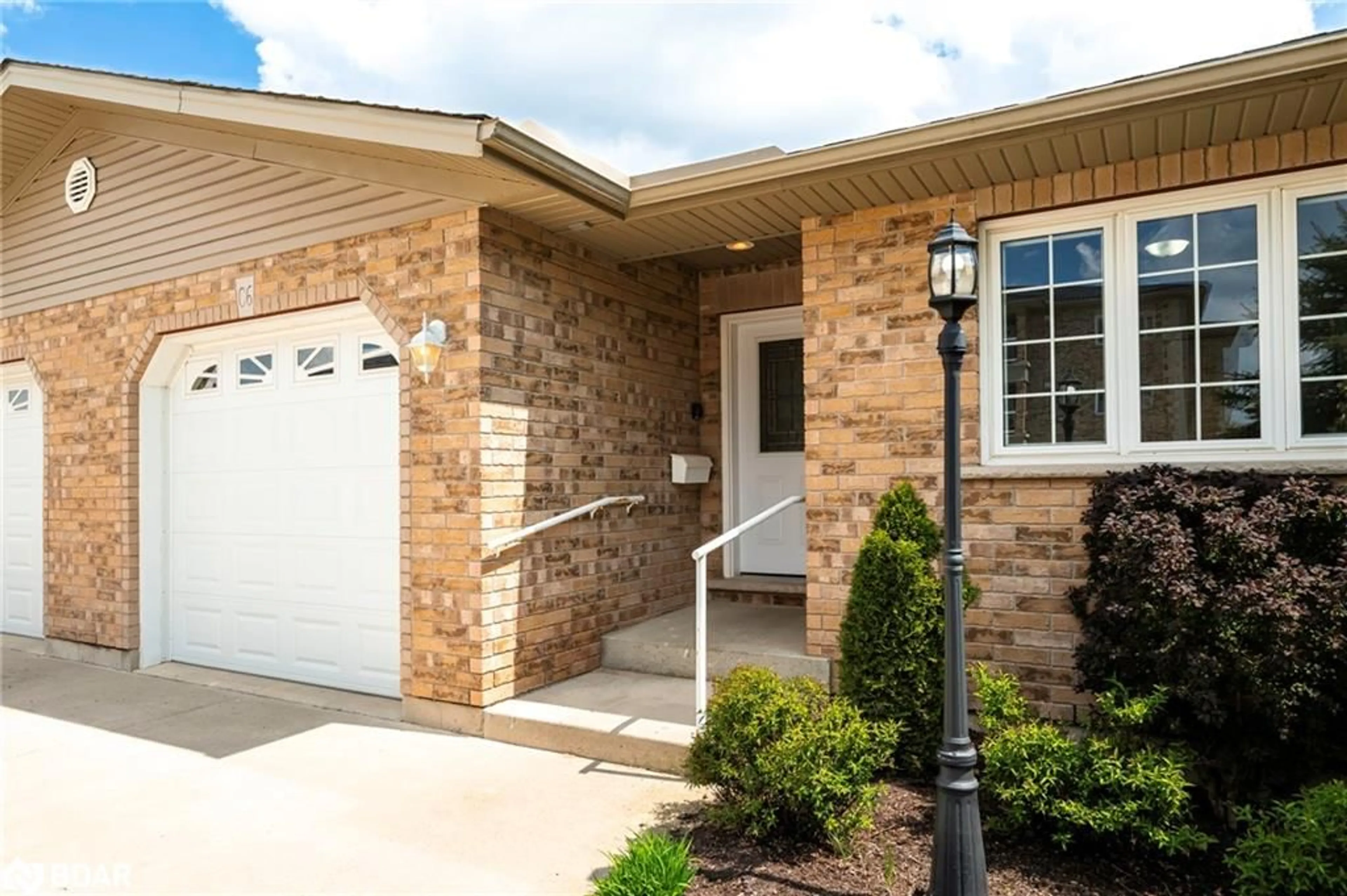 Home with brick exterior material, street for 401 Birmingham St #C6, Mount Forest Ontario N0G 2L2