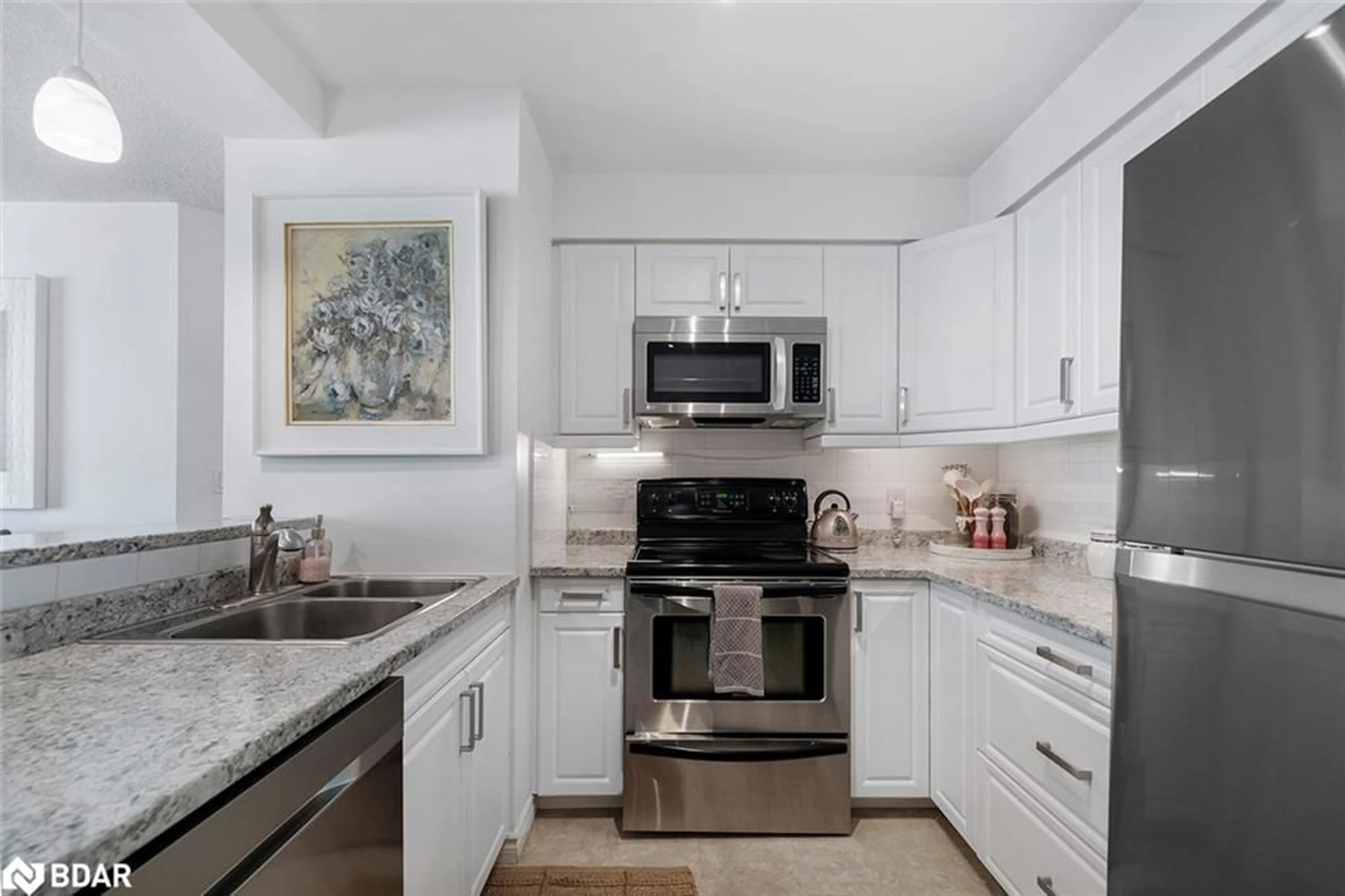 Standard kitchen, ceramic/tile floor for 150 Dunlop St #603, Barrie Ontario L4M 6H1