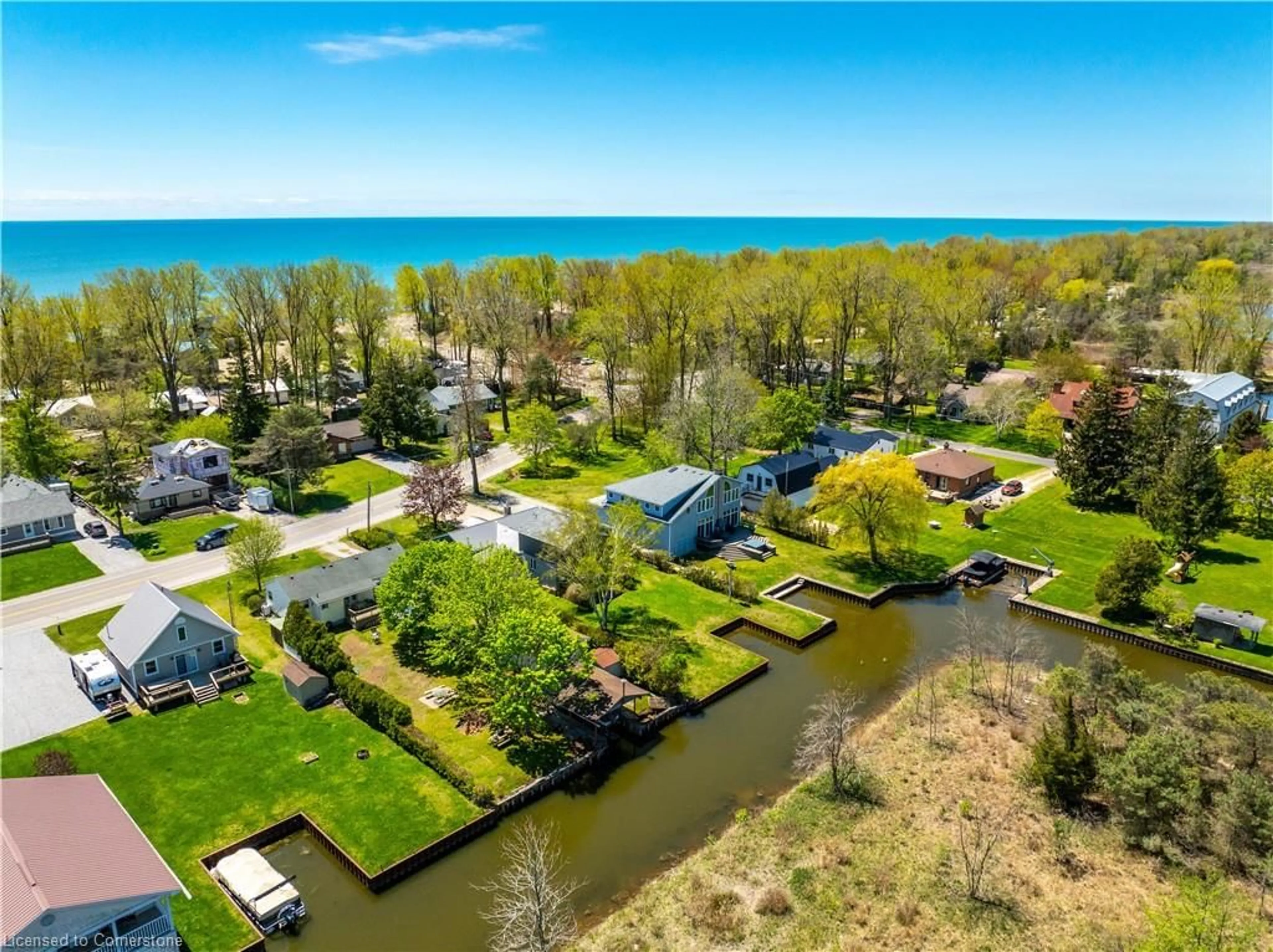 A pic from outside/outdoor area/front of a property/back of a property/a pic from drone, water/lake/river/ocean view for 270 Erie Blvd, Long Point Ontario N0E 1M0