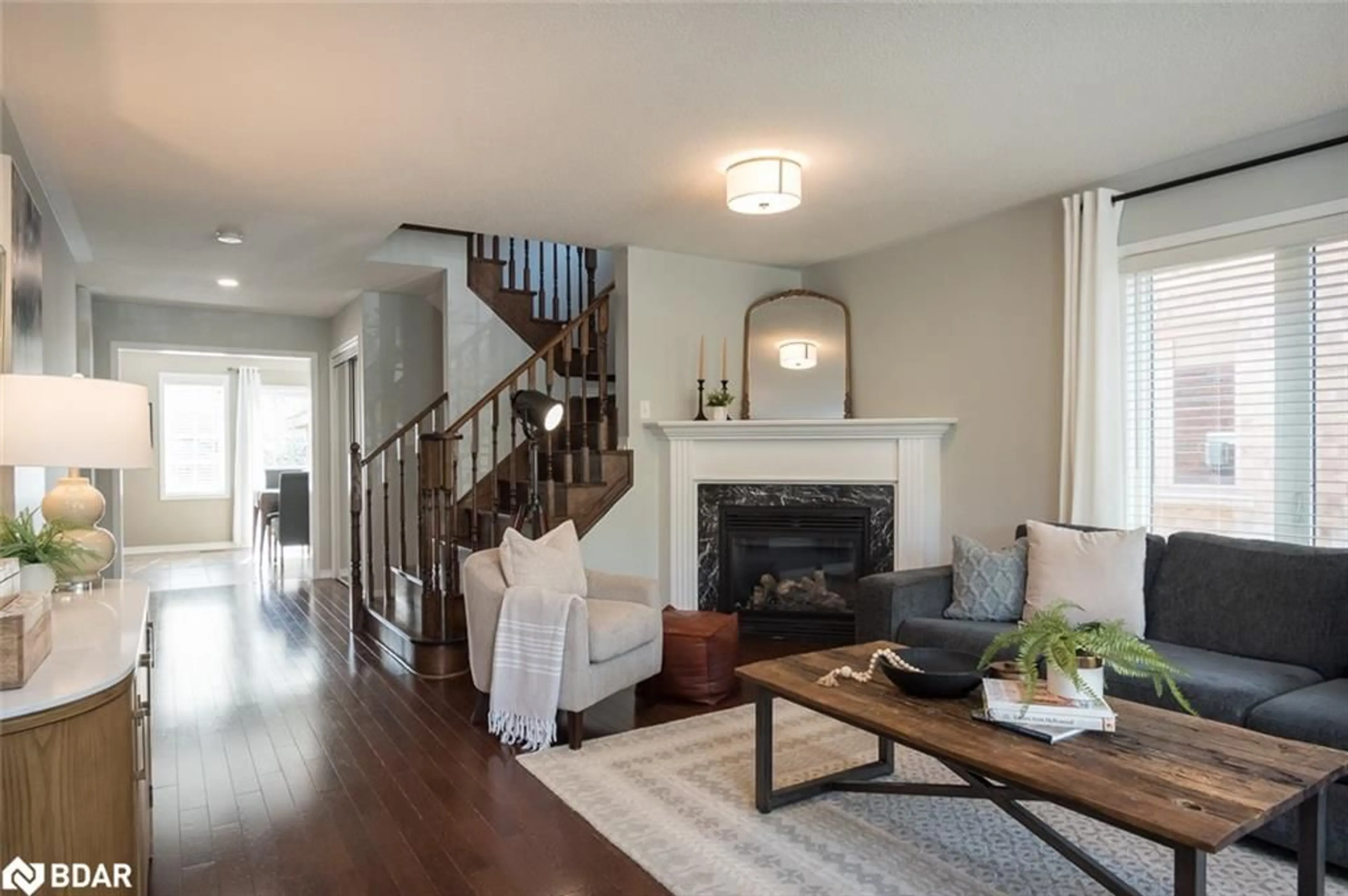 Living room with furniture, wood/laminate floor for 292 Giddings Cres, Milton Ontario L9T 7A9