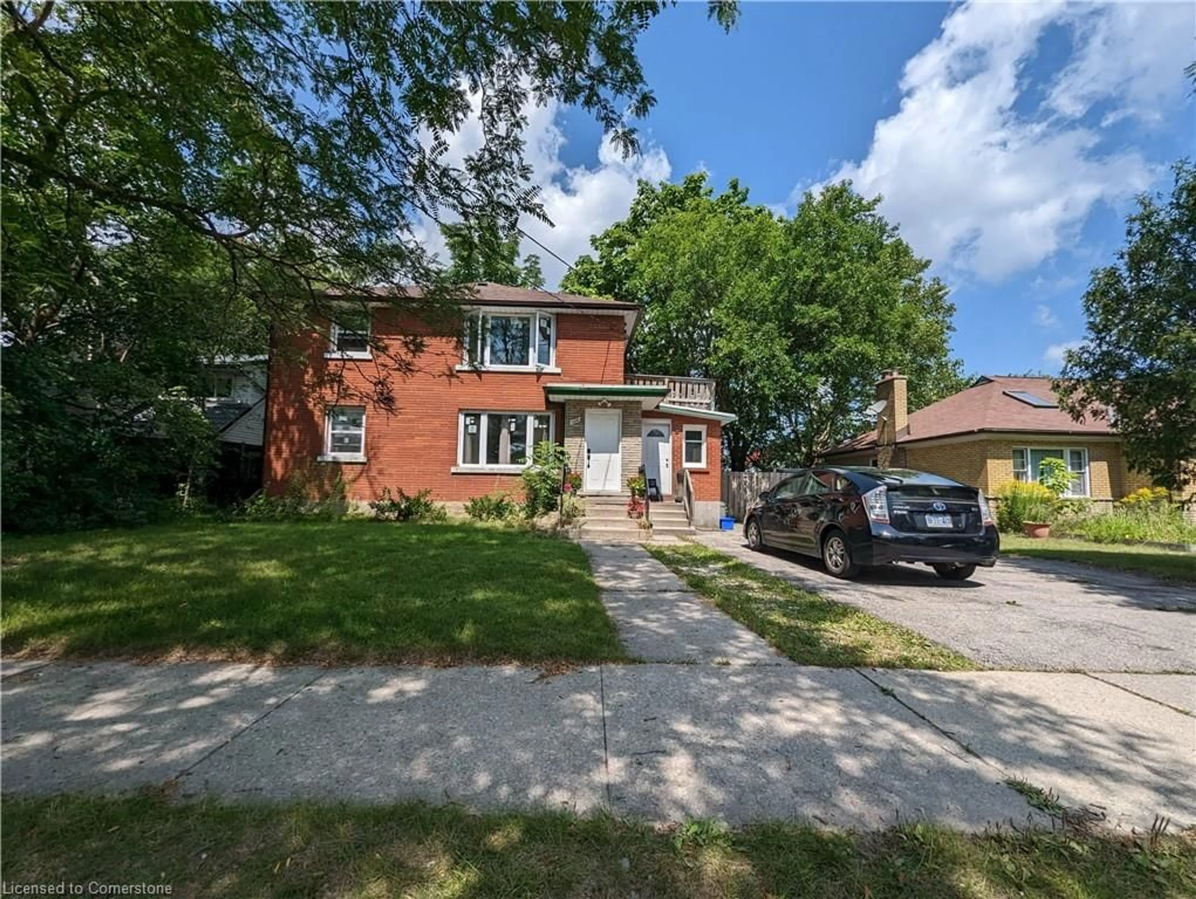 Home with brick exterior material, street for 108 Marlborough Ave, Kitchener Ontario N2M 1H8