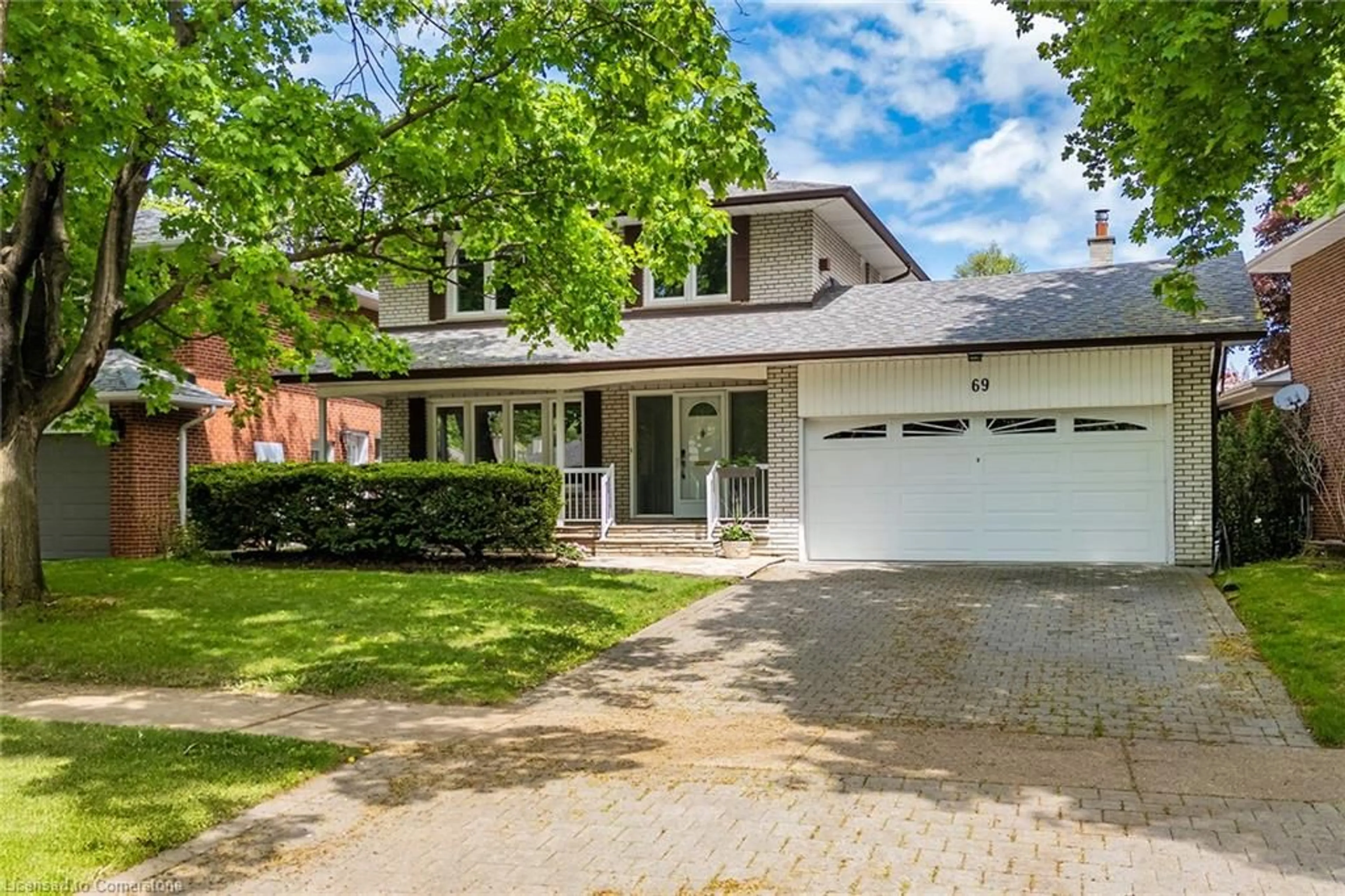 Home with brick exterior material, street for 69 Pettit Dr, Etobicoke Ontario M9R 2W6