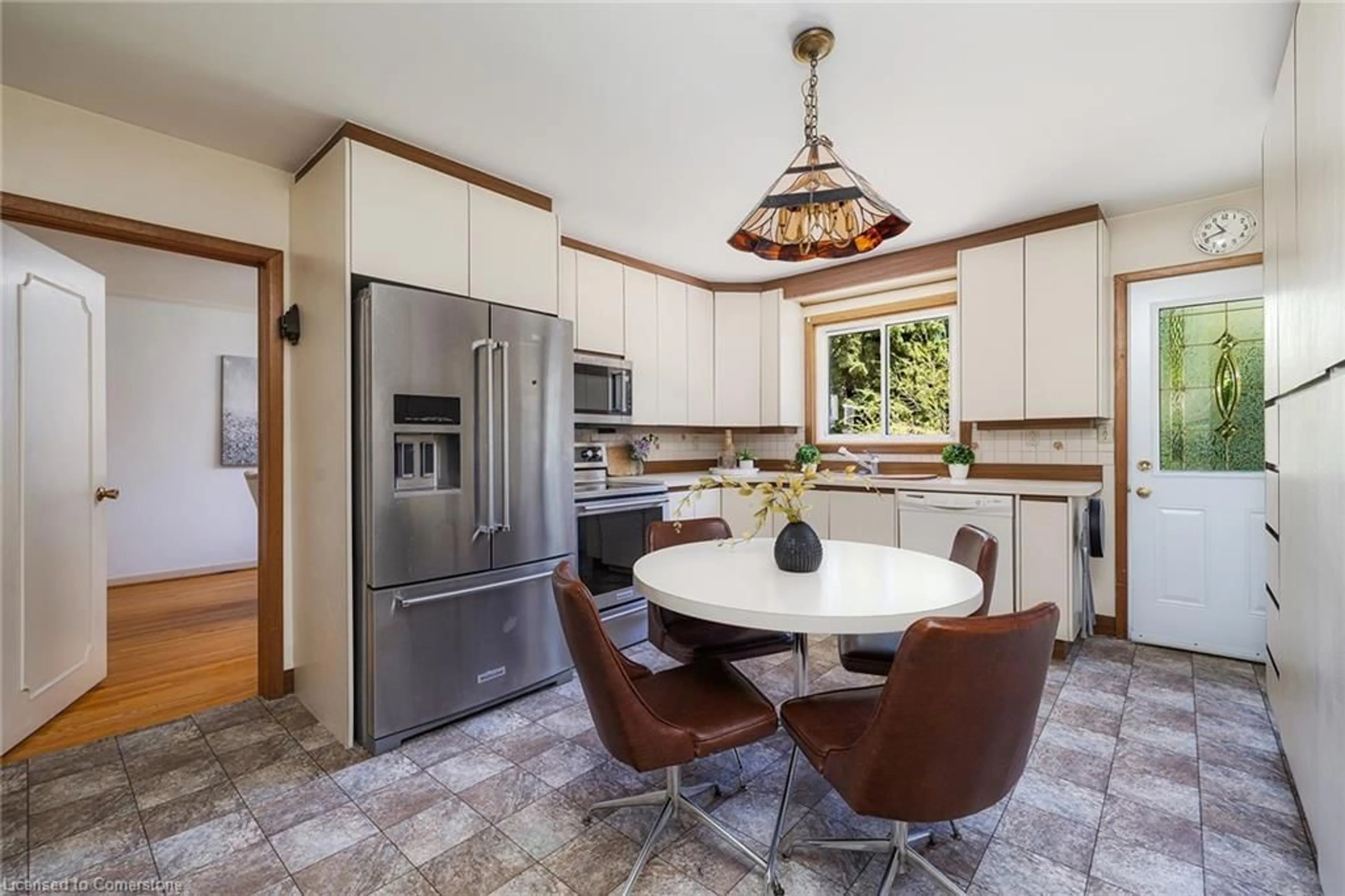 Open concept kitchen, ceramic/tile floor for 69 Pettit Dr, Etobicoke Ontario M9R 2W6