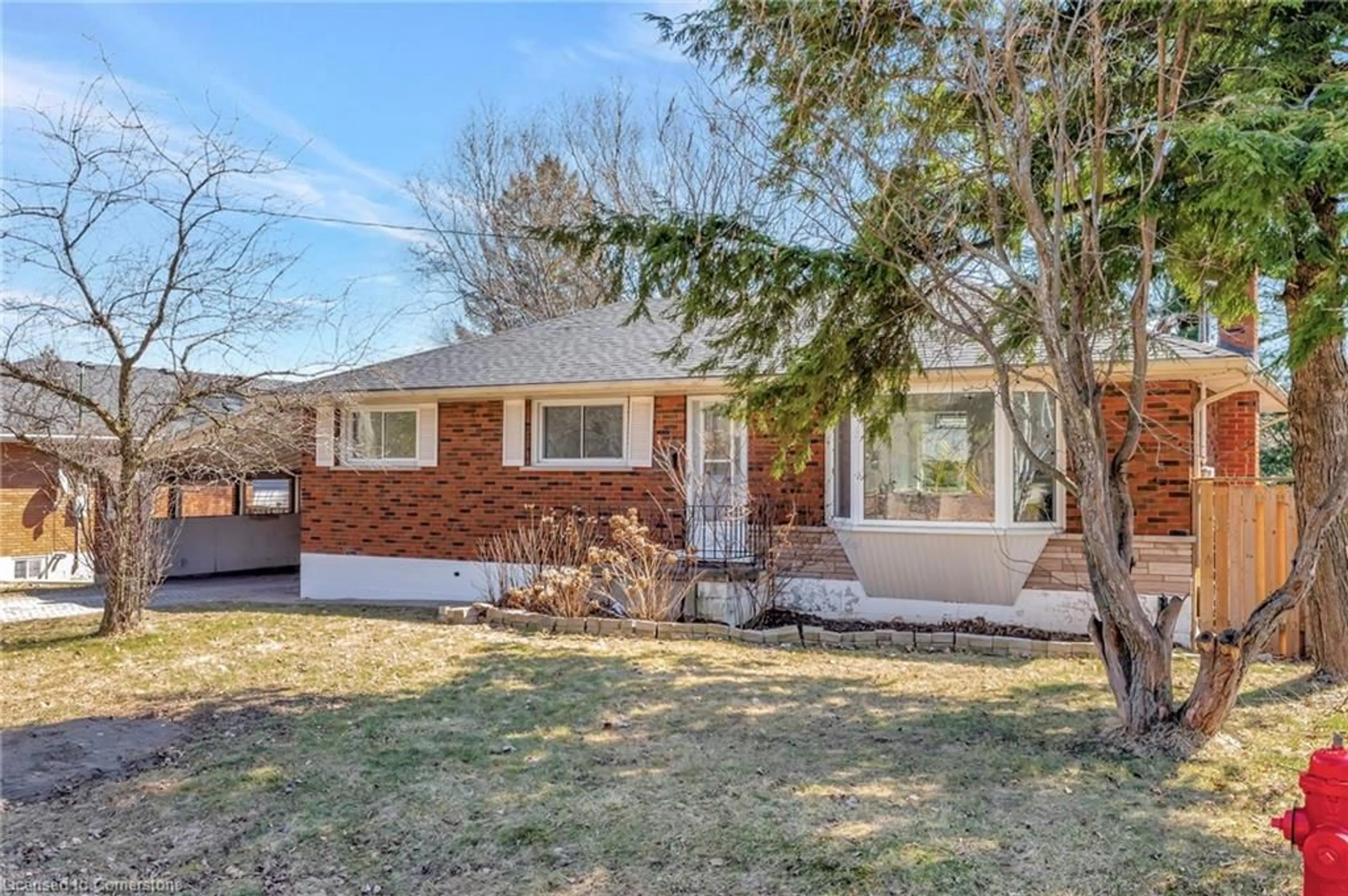Home with brick exterior material, street for 216 Sioux Rd, Hamilton Ontario L9G 1P8