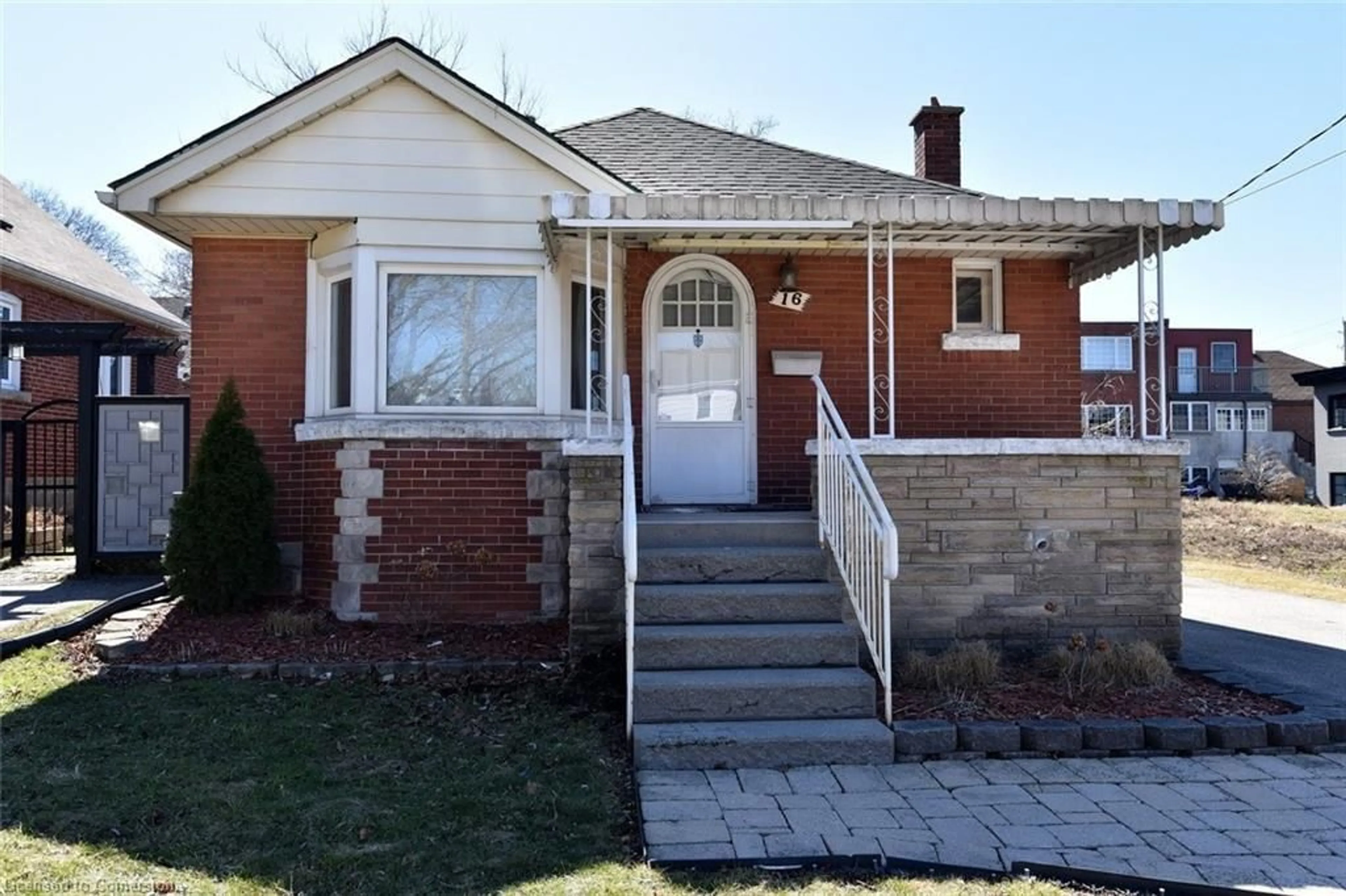 Home with brick exterior material, street for 16 Empress Ave, Hamilton Ontario L9A 1M2